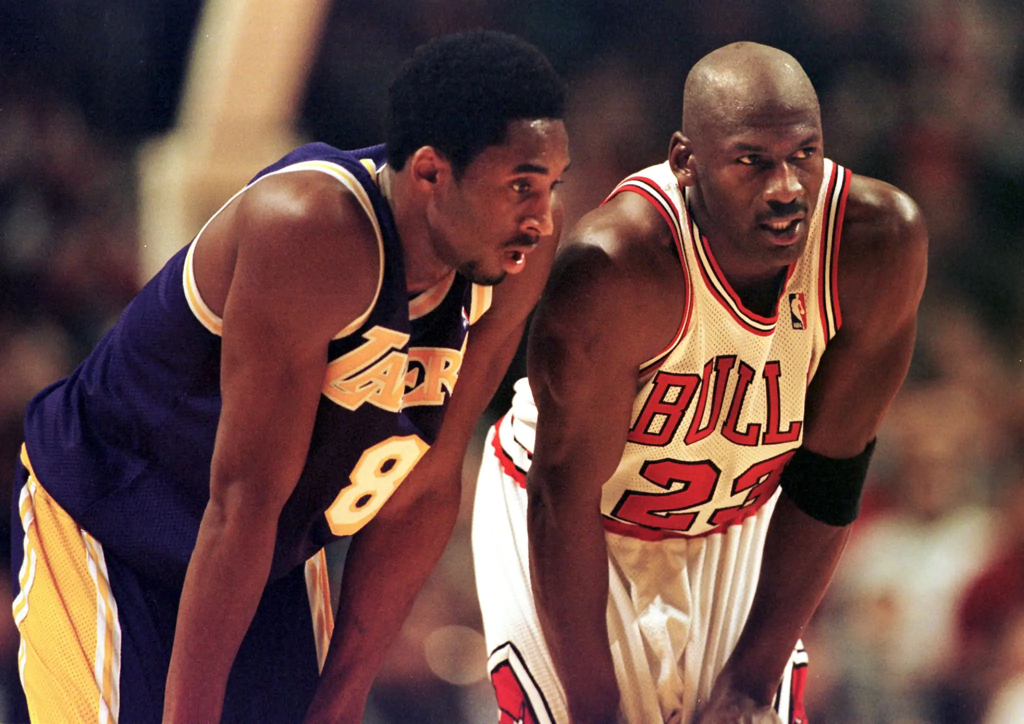 Kobe Bryant and Michael Jordan during an NBA game. Image: Getty