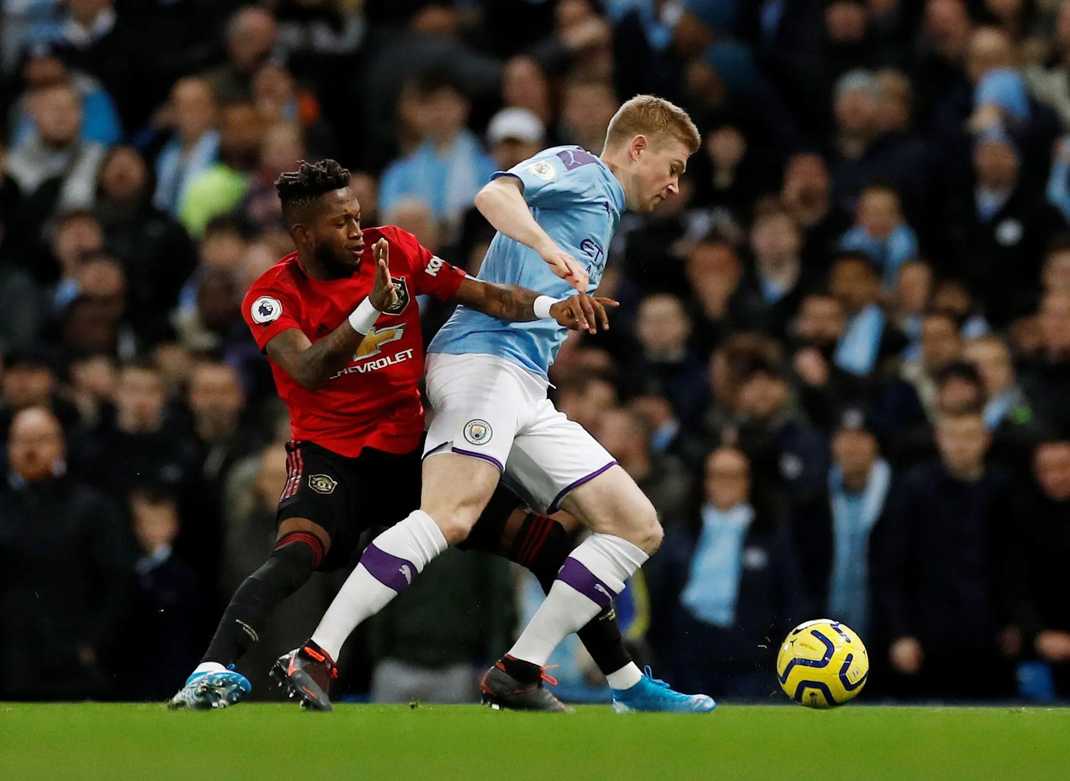 Manchester United's Fred battles against Manchester City's Kevin de Bruyne