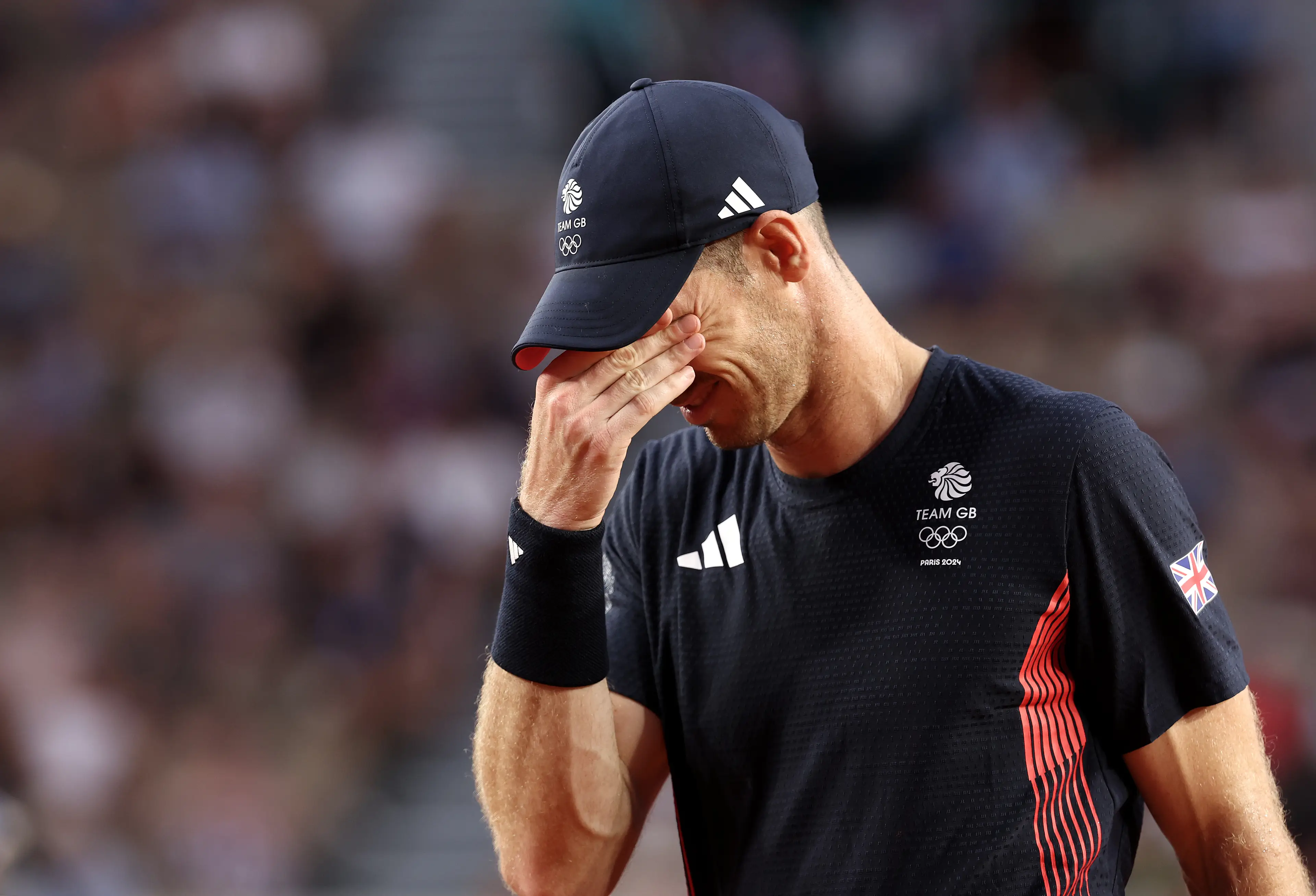 An emotional Andy Murray departs the court for the final time (Getty)
