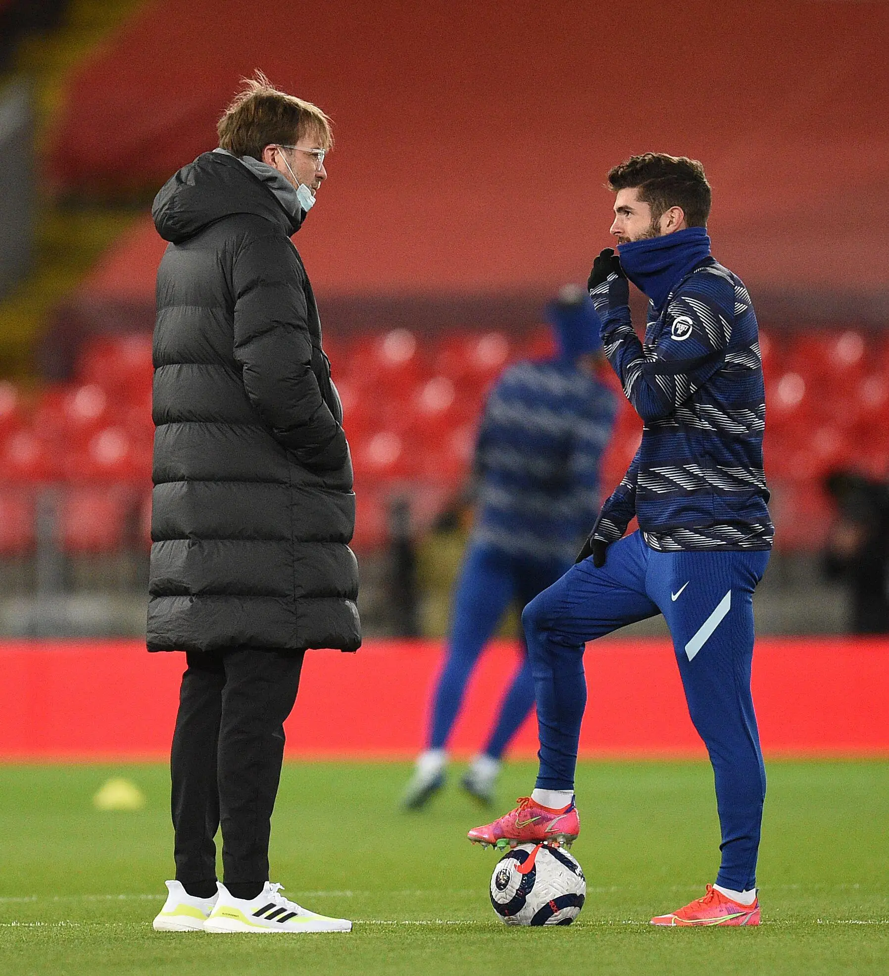 Liverpool manager Jurgen Klopp (left) speaks with Chelsea's Christian Pulisic before the Premier League match at Anfield, Liverpool. (Alamy)