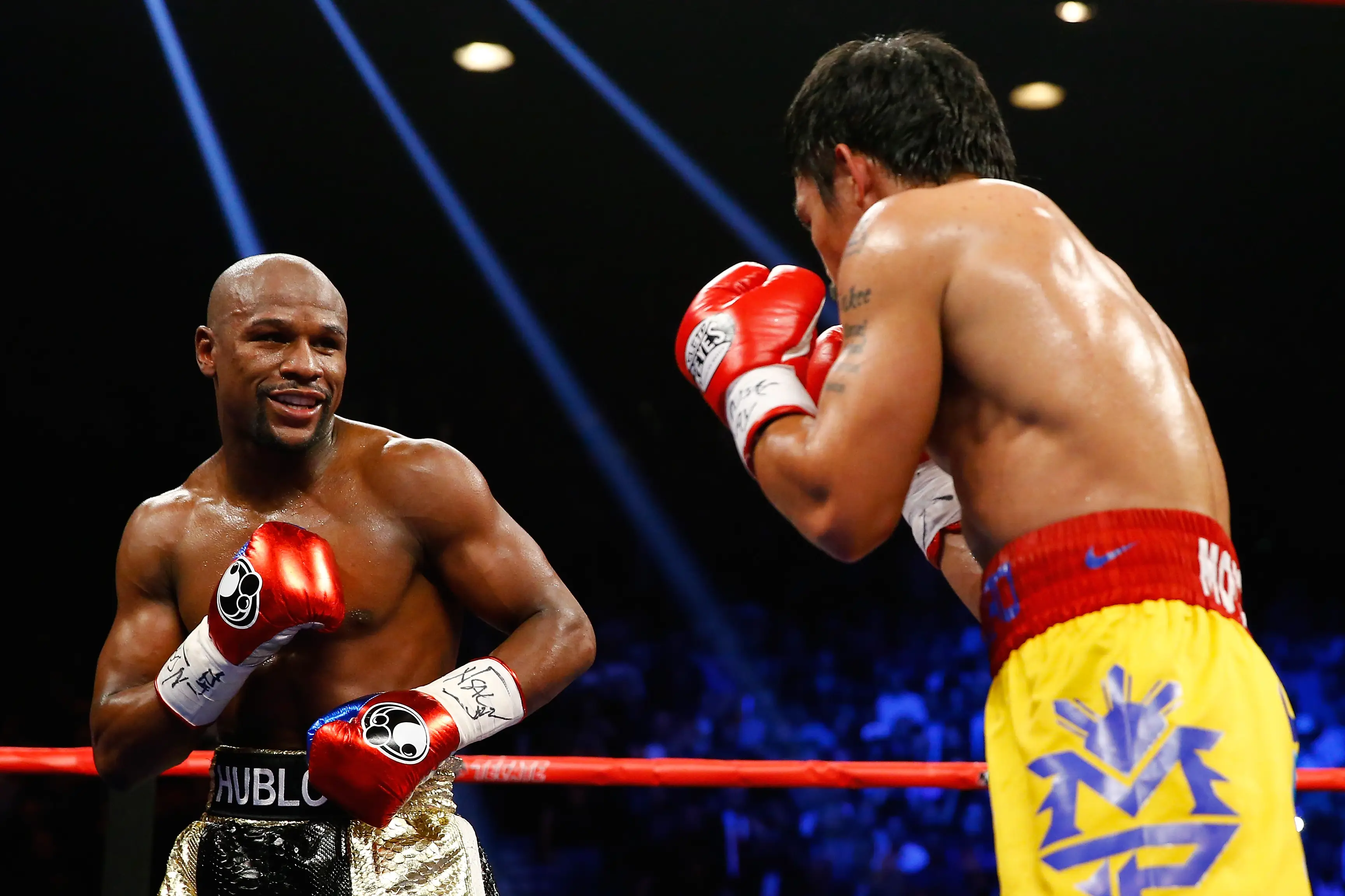 Floyd Mayweather and Manny Pacquiao during their 2015 super-fight. Image: Getty 
