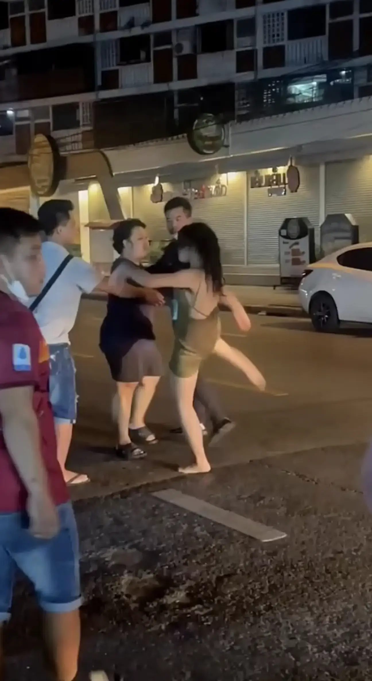 A former female boxer unleashed a flurry of kicks and punches on a man after he poured a drink over her head.