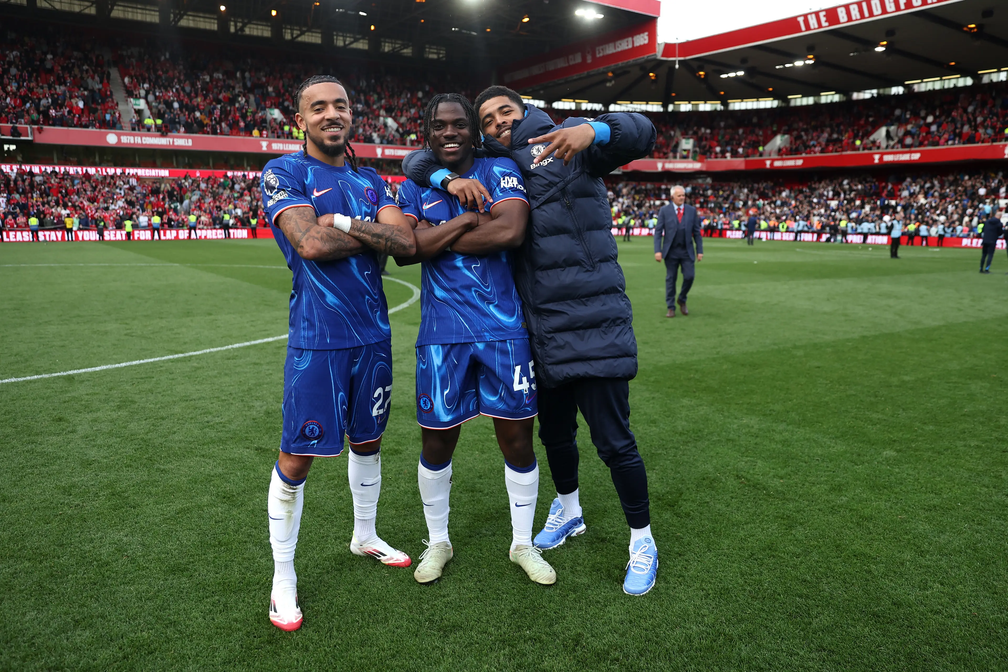 Malo Gusto, Romeo Lavia and Wesley Fofana celebrate securing Champions League football. Image credit: Getty