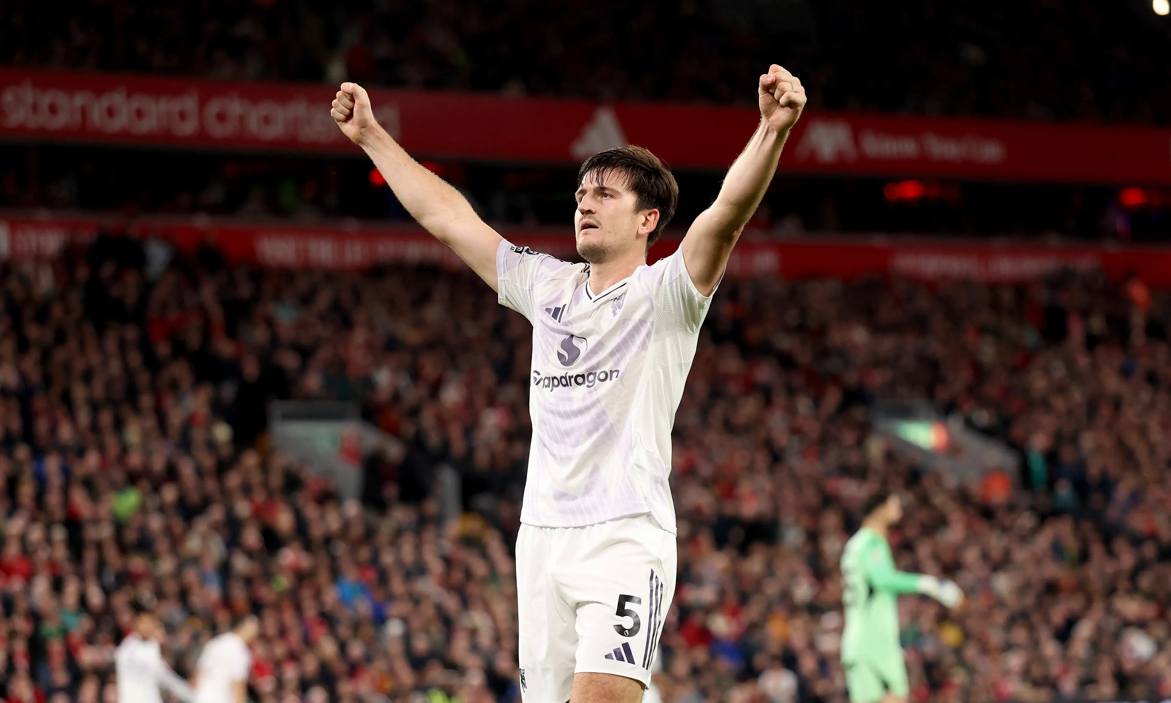Harry Maguire celebrates scoring for Manchester United against Liverpool. Image: Getty 
