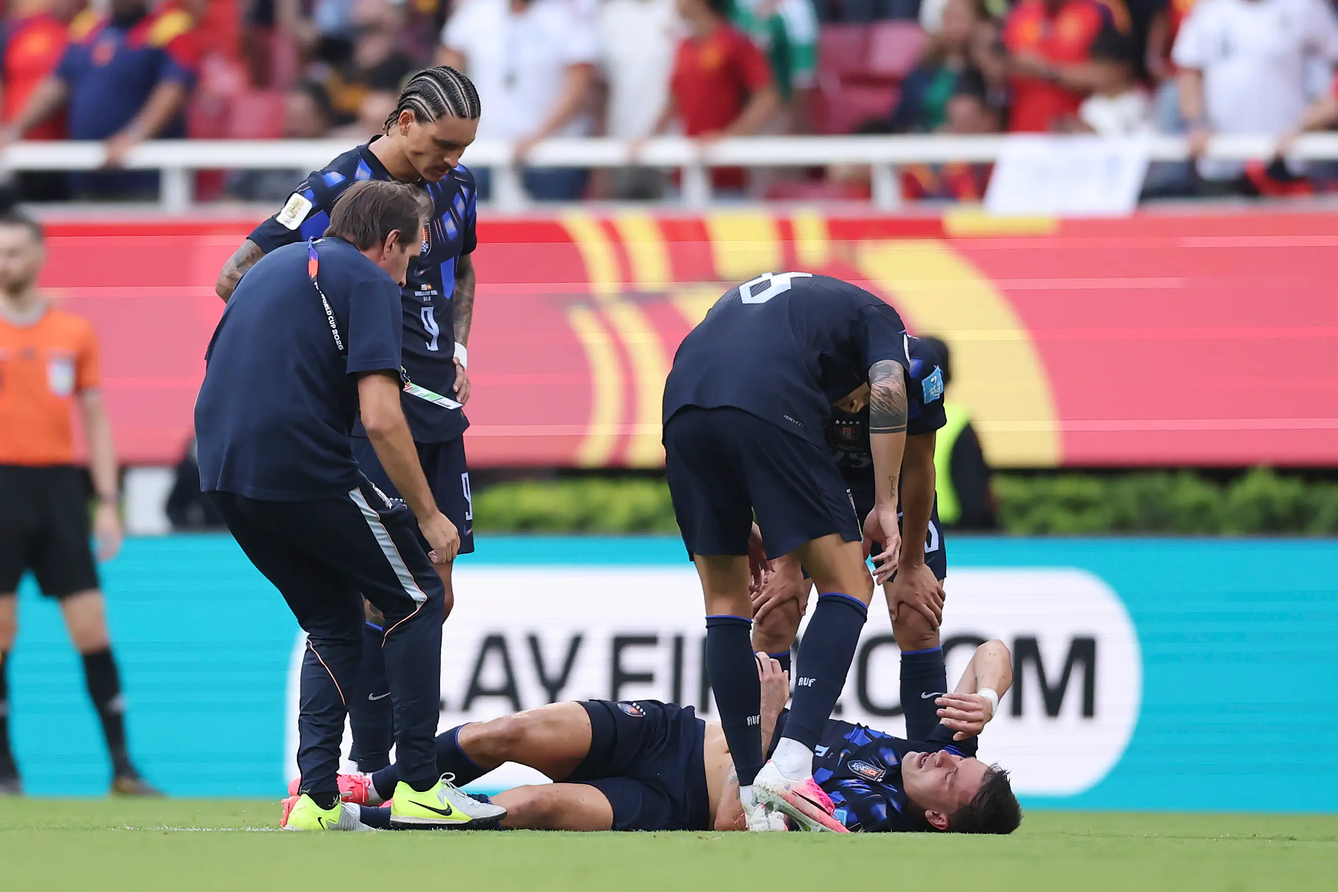 Ugarte was stretchered off against Spain. Image credit: Getty