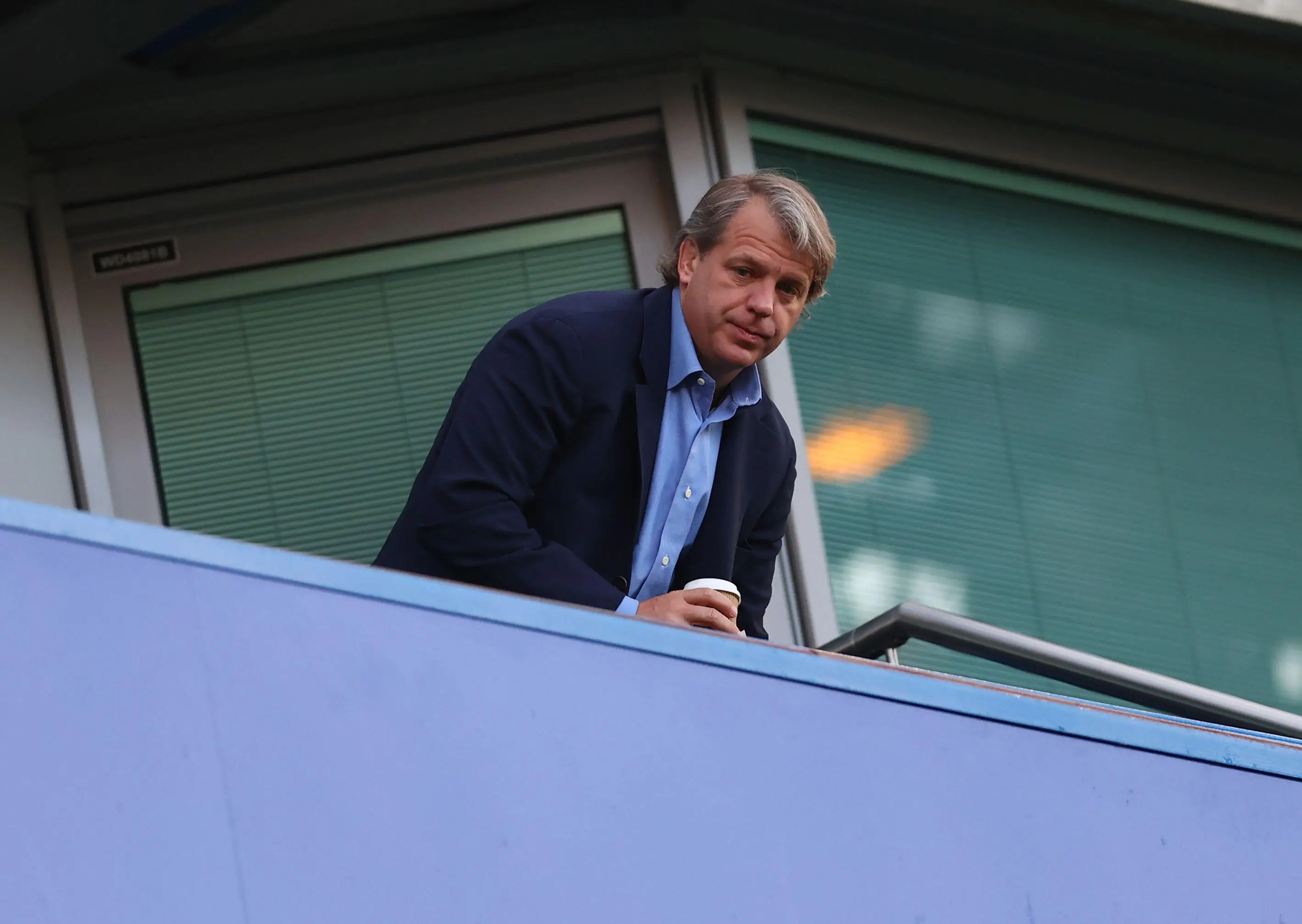 Todd Boehly takes his seat during a Premier League match at Stamford Bridge. (Alamy)