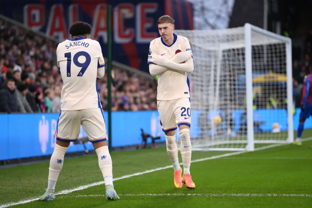 Jadon Sancho celebrated with Cole Palmer after Chelsea took the lead against Crystal Palace. (Image: Getty)