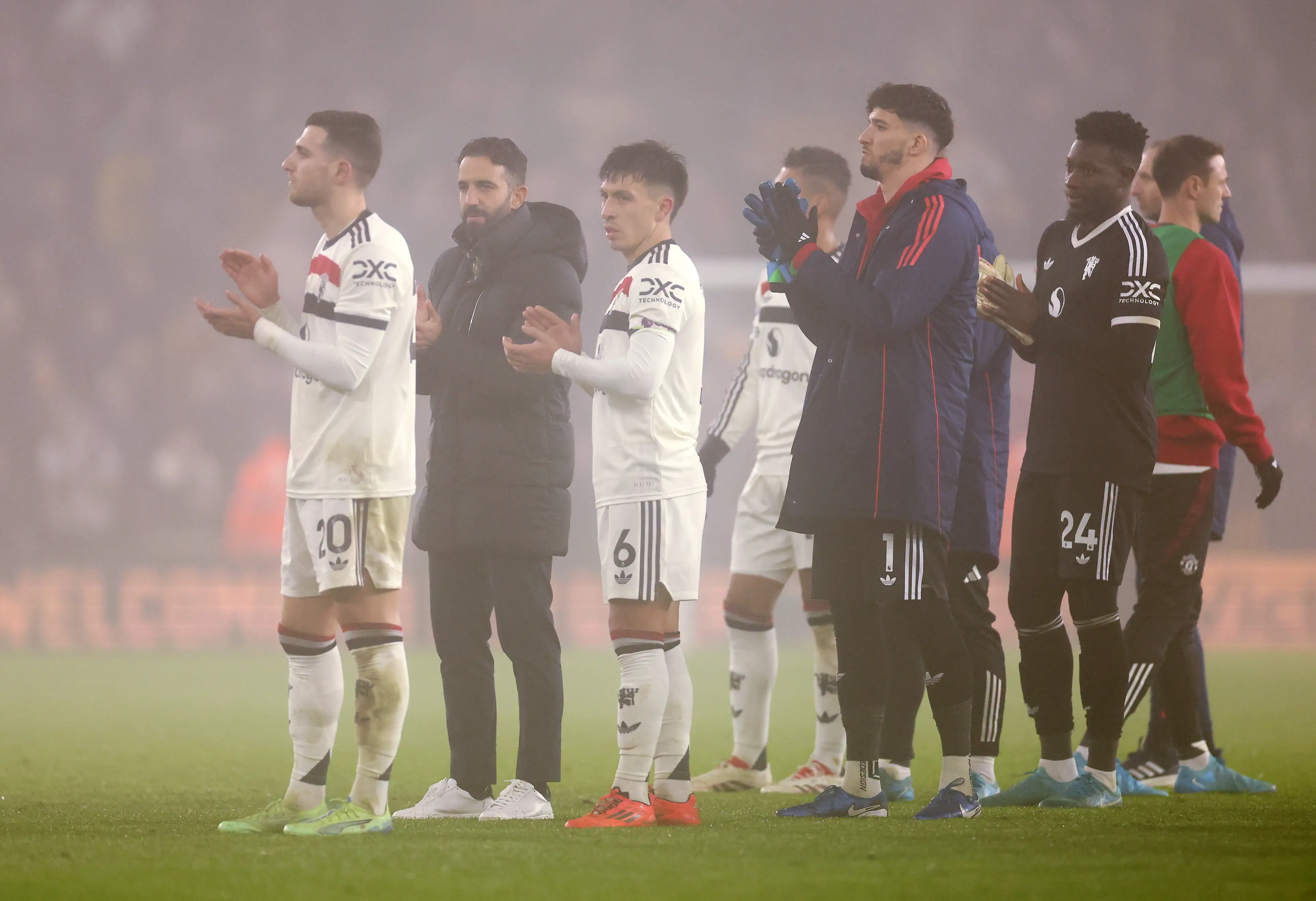 Amorim and his players after the full-time whistle on Thursday. Image credit: Getty