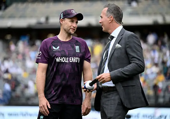 Michael Vaughan speaking with fellow former England captain Joe Root in Brisbane (Image: Getty)