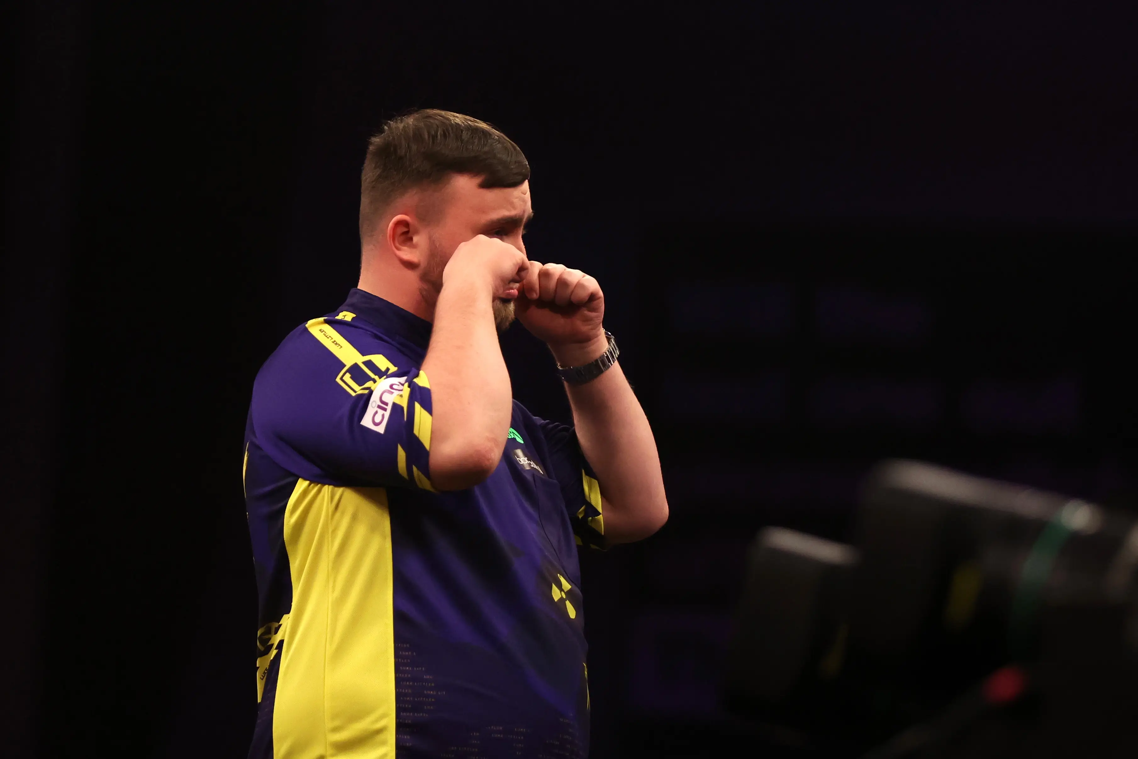 Luke Littler did a crybaby gesture to fans in leeds. Image: Getty