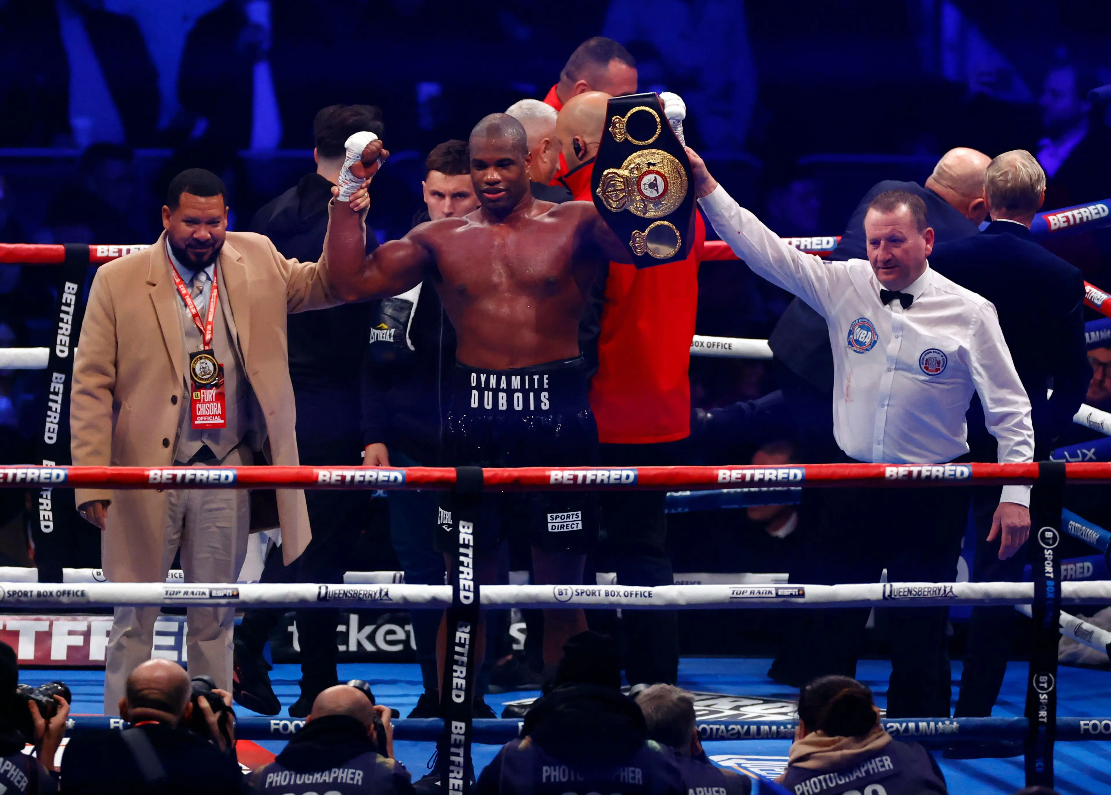 Daniel Dubois celebrates with the WBA (regular) belt. Image: Alamy 