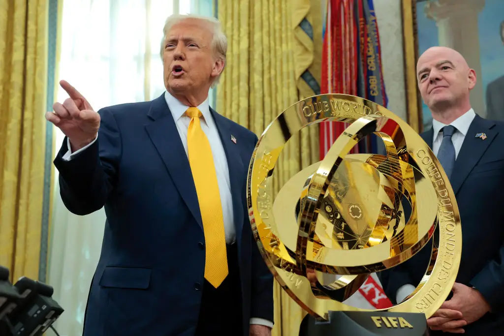 Donald Trump welcomed the Club World Cup trophy into the Oval Office ahead of the tournament. (Image: Getty)