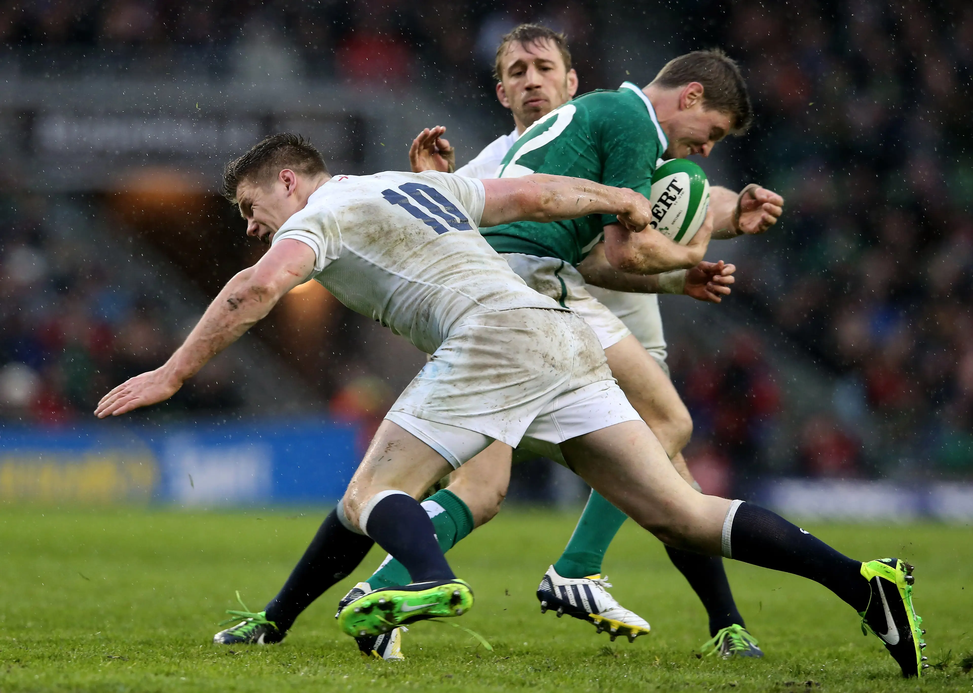 Owen Farrell of England puts in a tackle on Ronan O'Gara of Ireland during the RBS Six Nations (Getty Images)