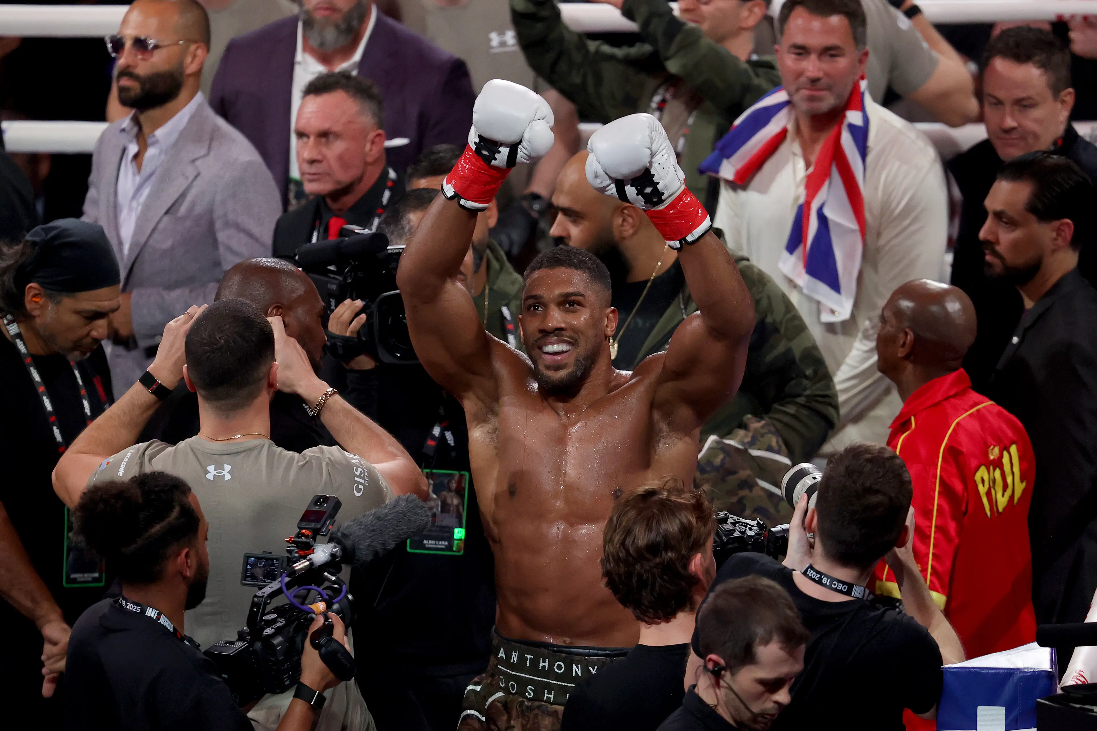 Anthony Joshua celebrates his victory over Jake Paul. Image: Getty 