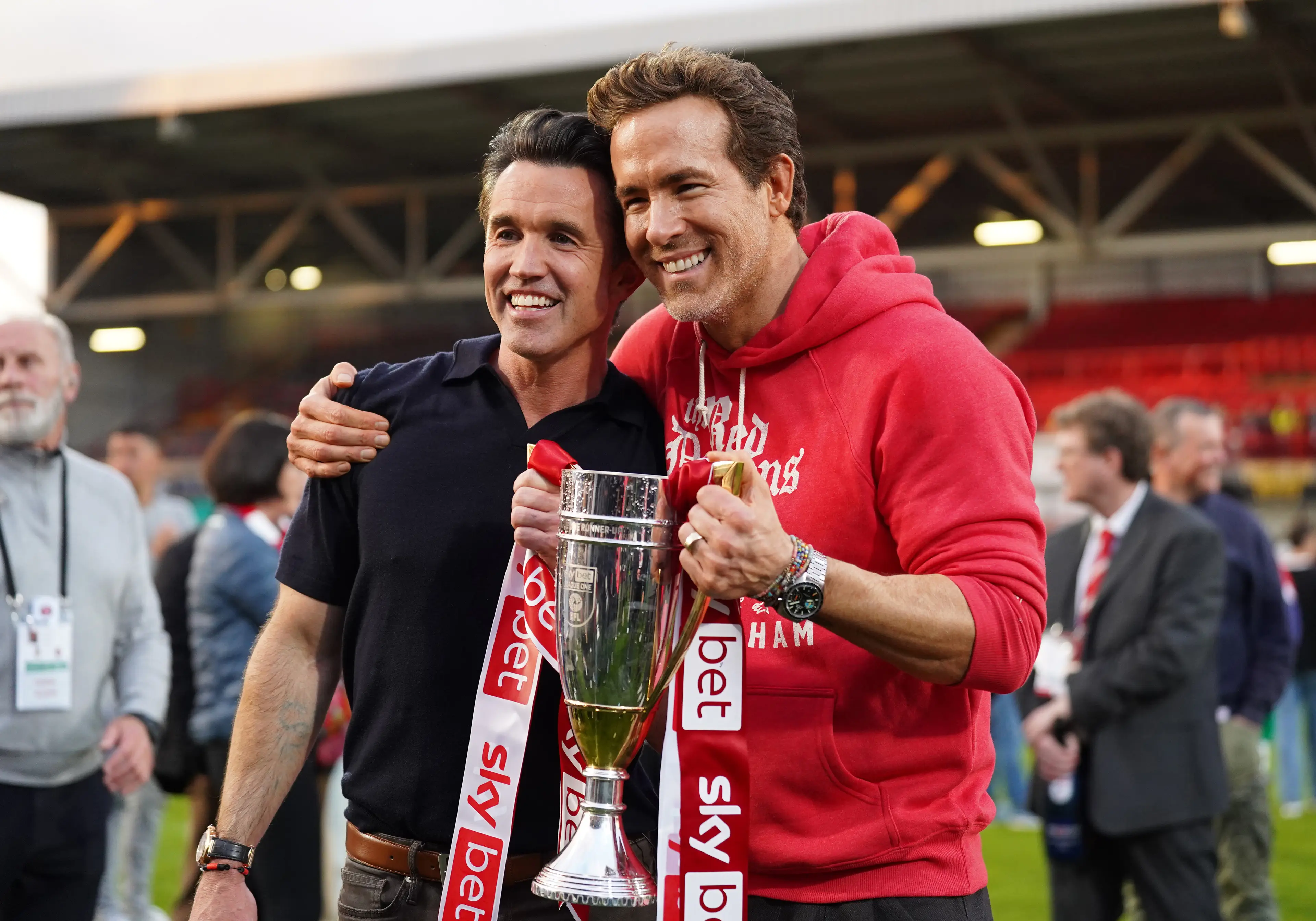 Ryan Reynolds and Rob McElhenney celebrate Wrexham's promotion. Image: Getty 