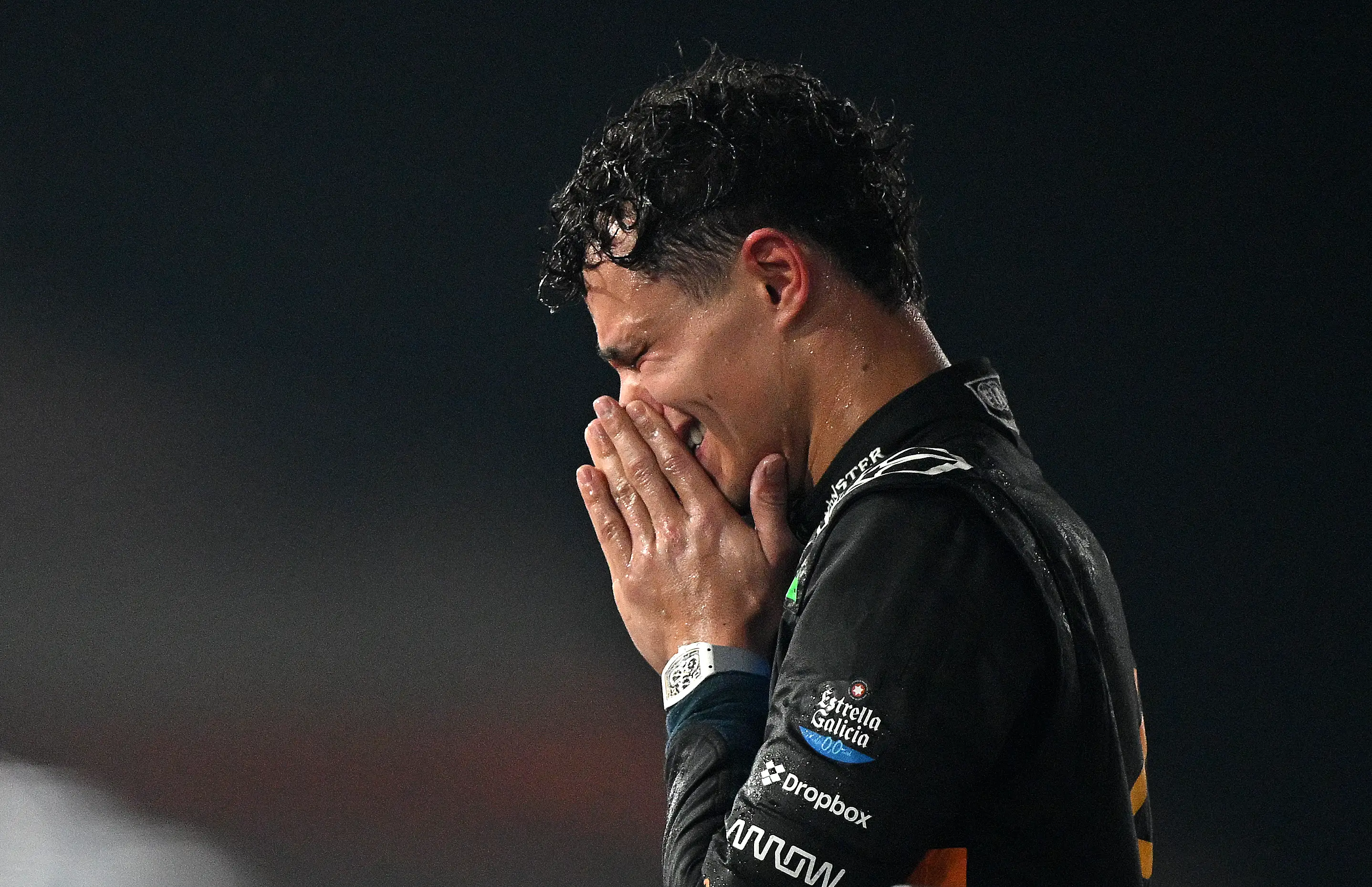 Lando Norris celebrates on the podium in Abu Dhabi (Image: Getty)