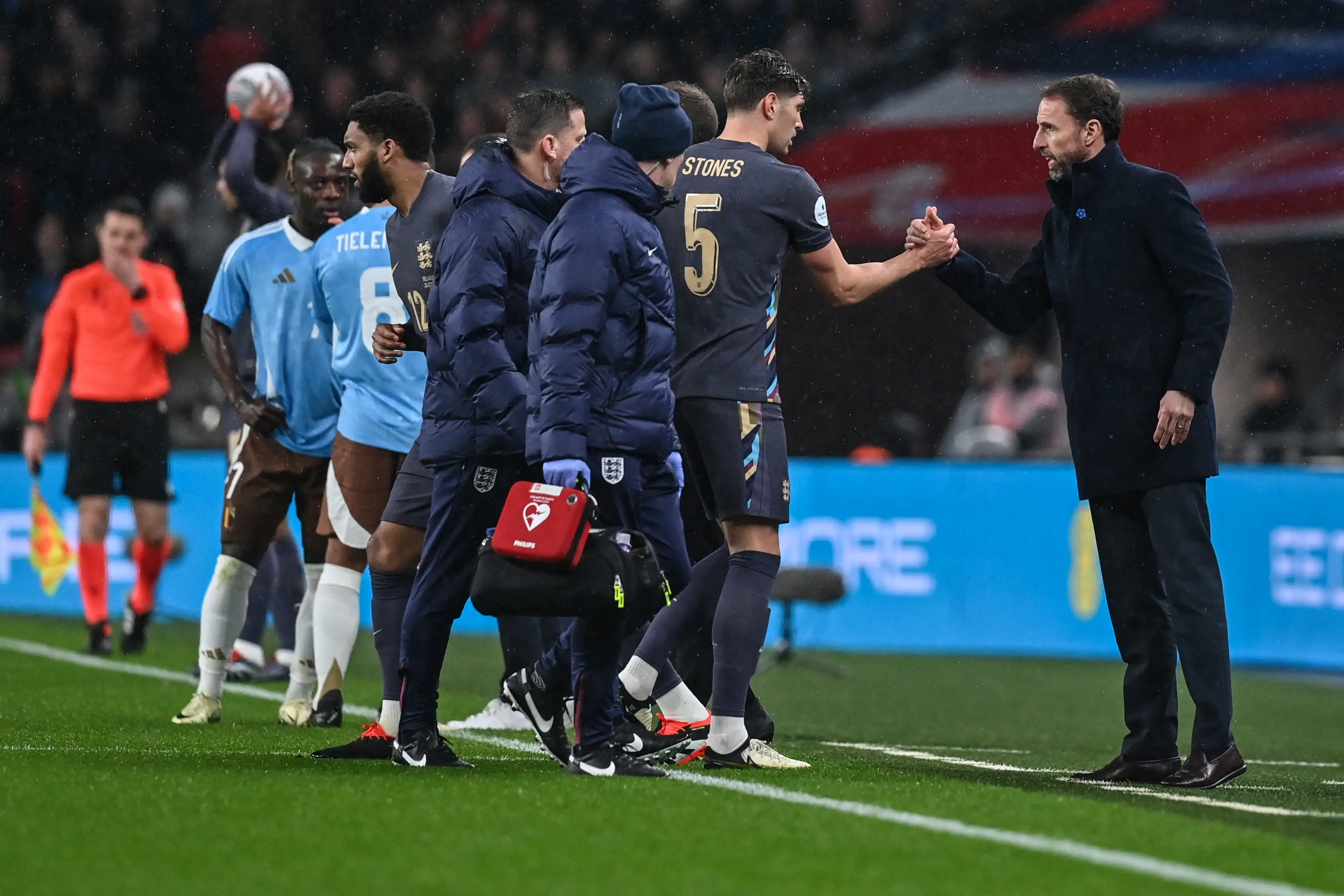John Stones leaves the pitch after picking up an injury. Image: Getty 