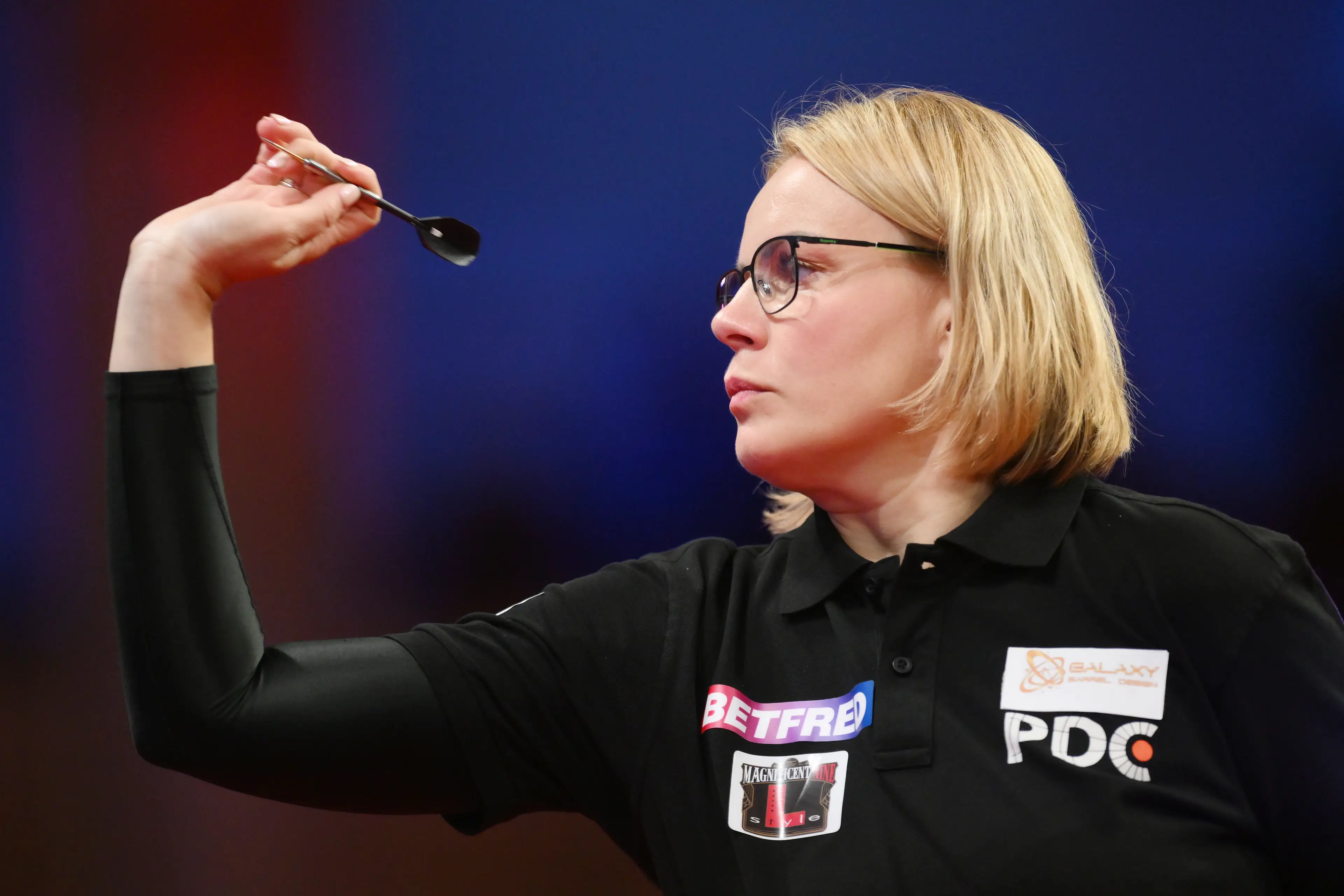 Dobromyslova throws against Fallon Sherrock during the Women's 2024 Betfred World Matchplay Finals. Image credit: Getty