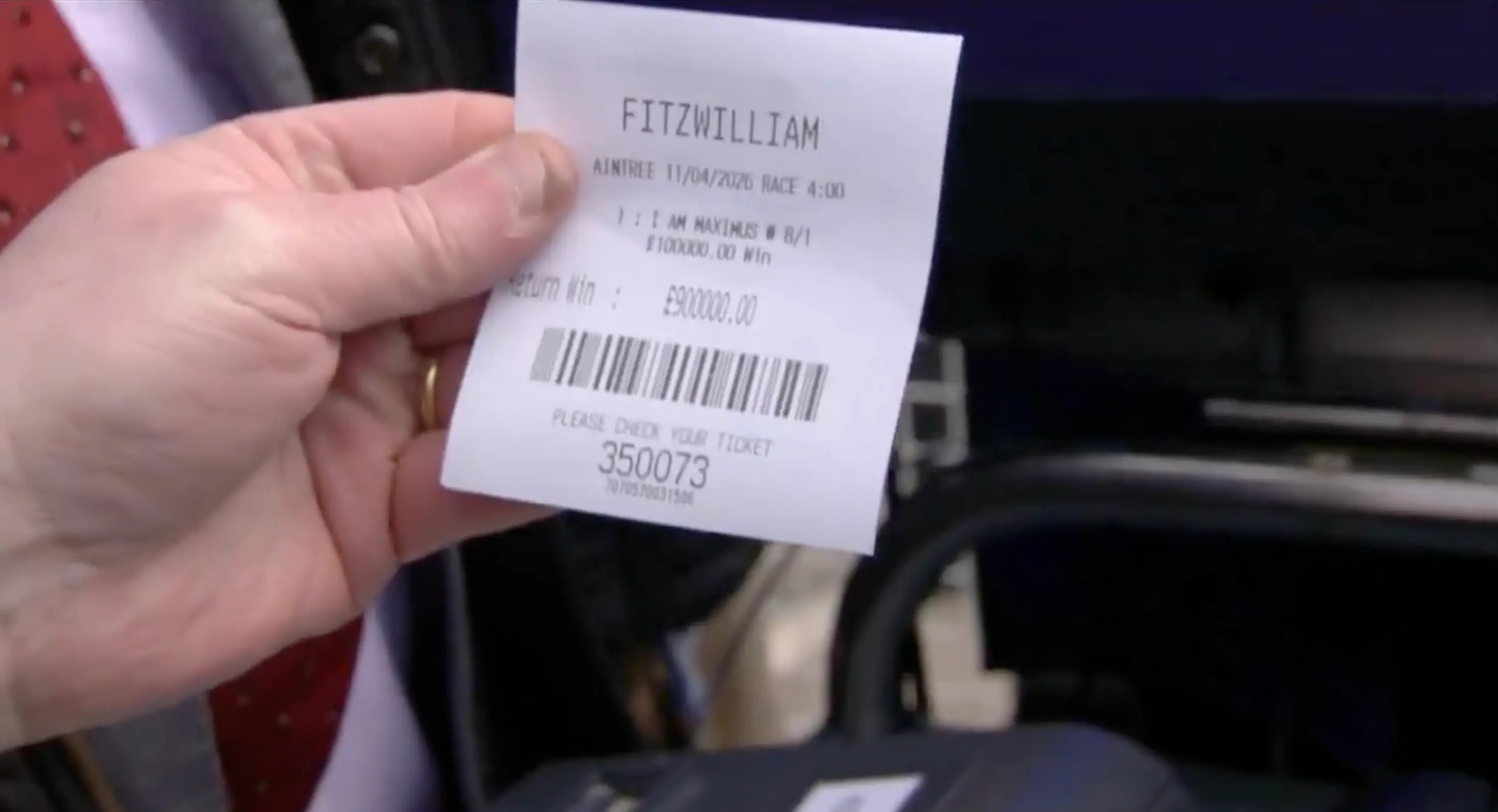 Gleeson shows viewers the betting slip. Image credit: ITV