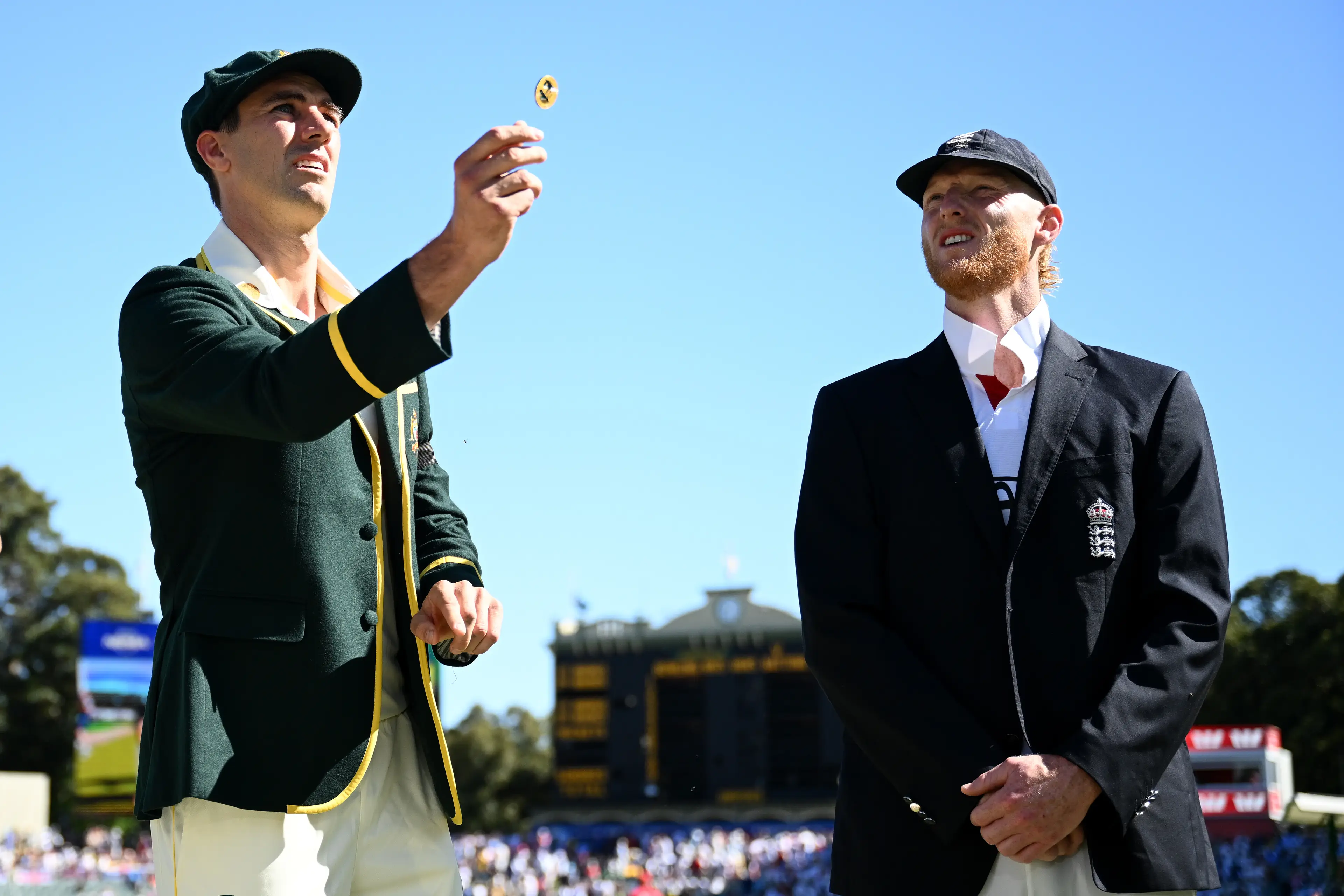 Pat Cummins and Ben Stokes during the coin toss for the Test Ashes test. Image: Getty 