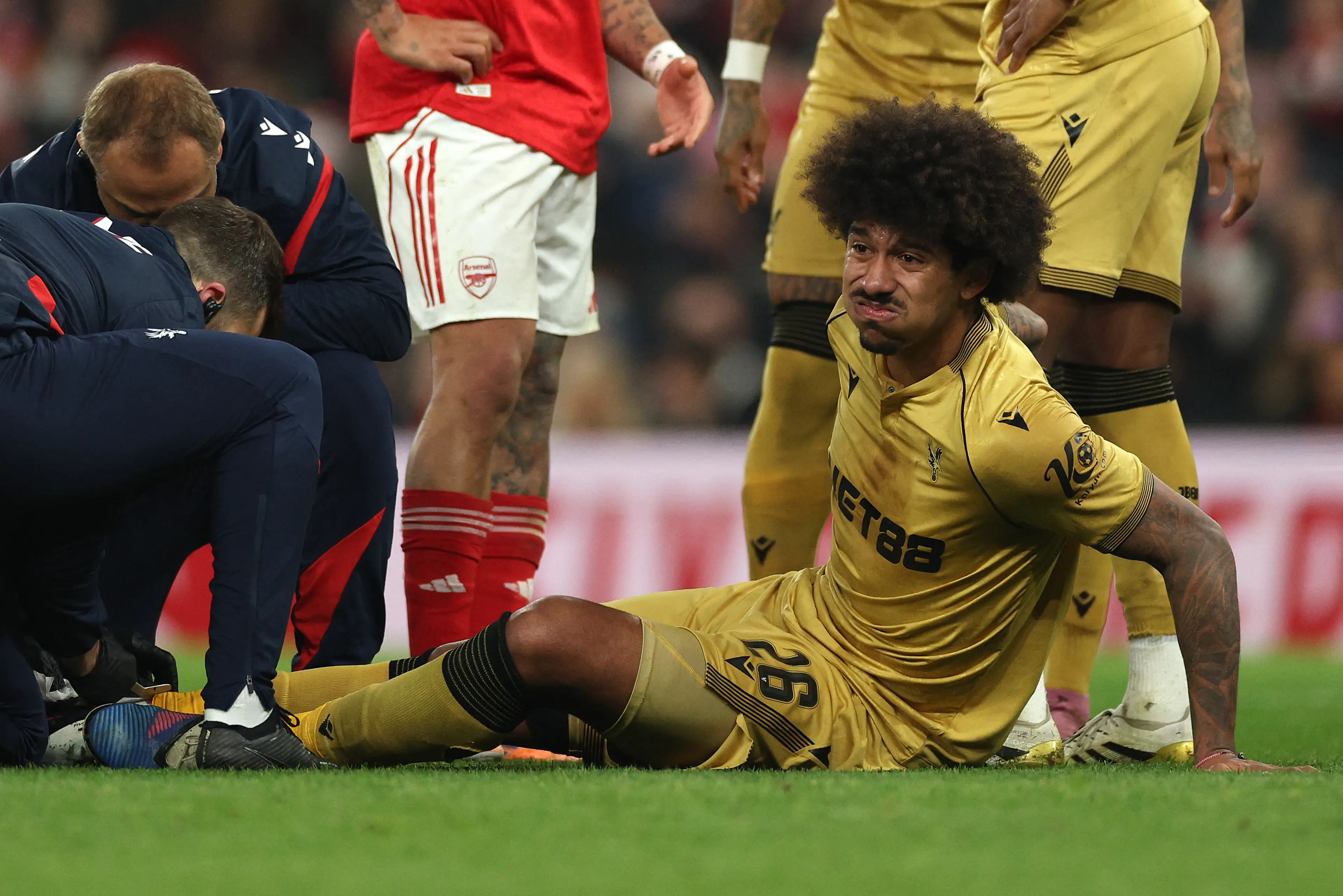 Richards was in serious discomfort as physios attended to his foot. Image credit: Getty