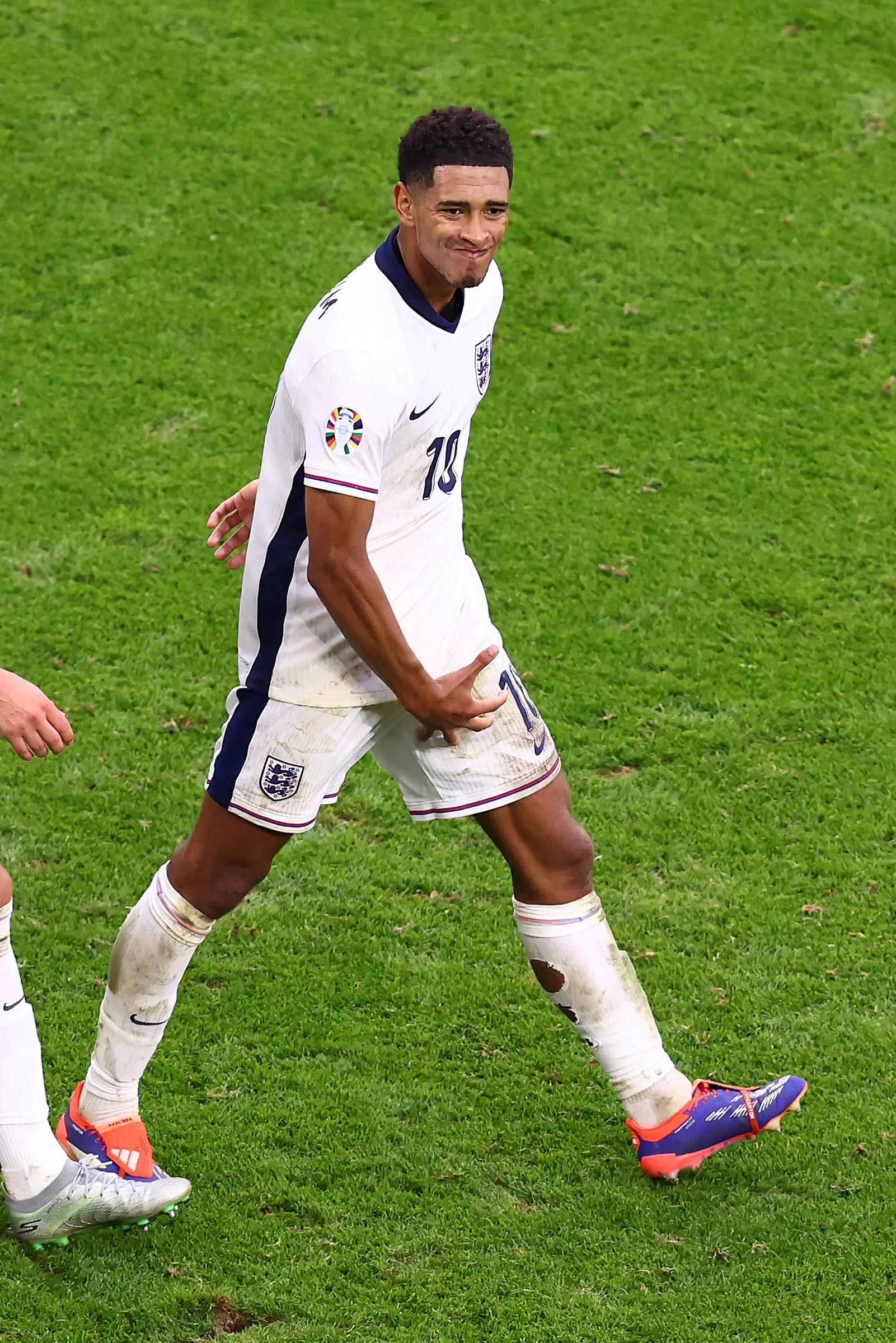 Jude Bellingham performs a lewd gesture after his goal against Slovakia. Image: Getty 