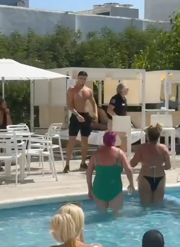 Harratt was confronted after launching a chair in the direction of a woman. Image credit: TikTok/@2tops2