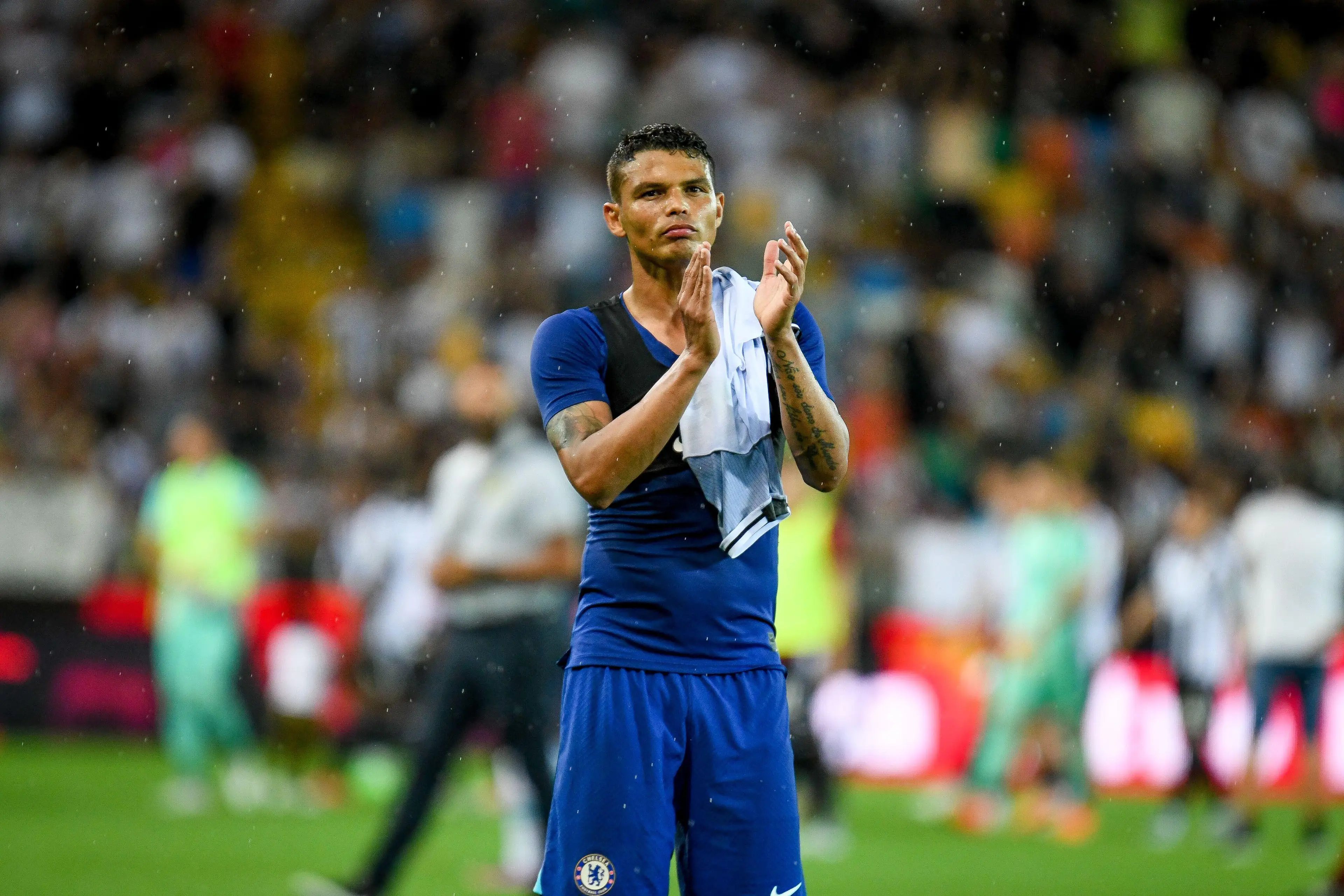 Thiago Silva applauds the Chelsea fans after their win against Udinese. (Alamy)