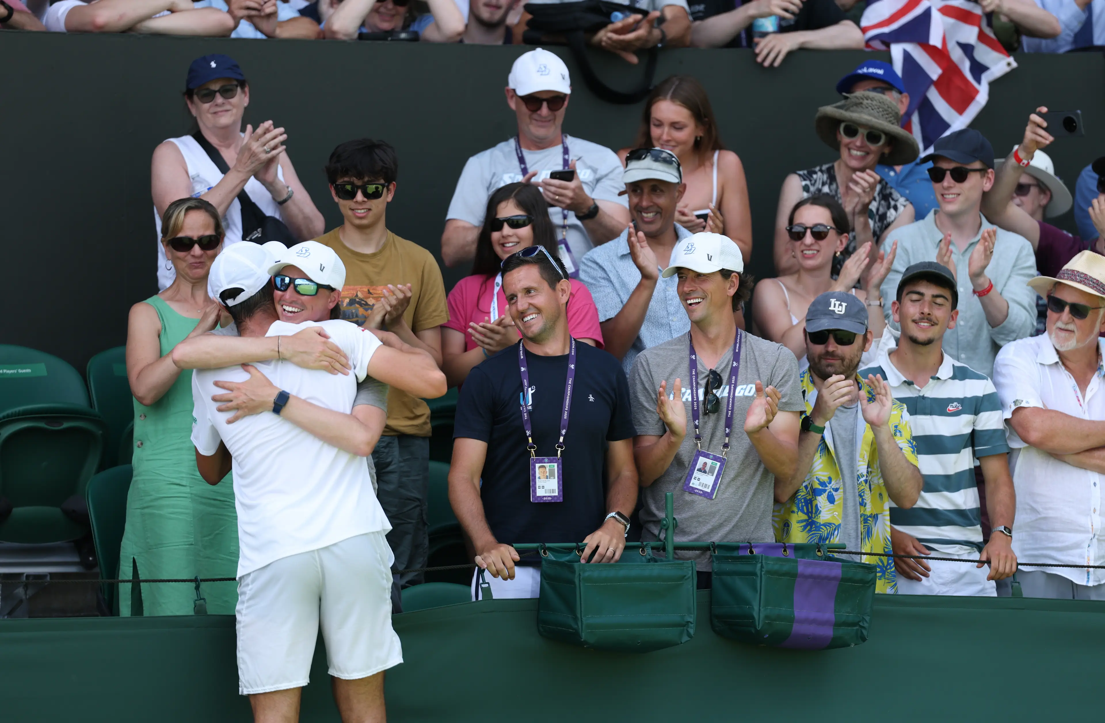 Tarvet hugs his coach after the win on Monday. Image credit: Getty