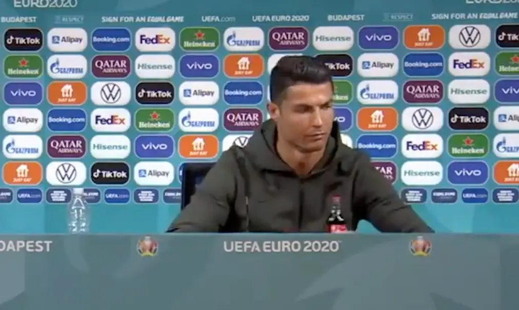 Ronaldo moving the bottles.