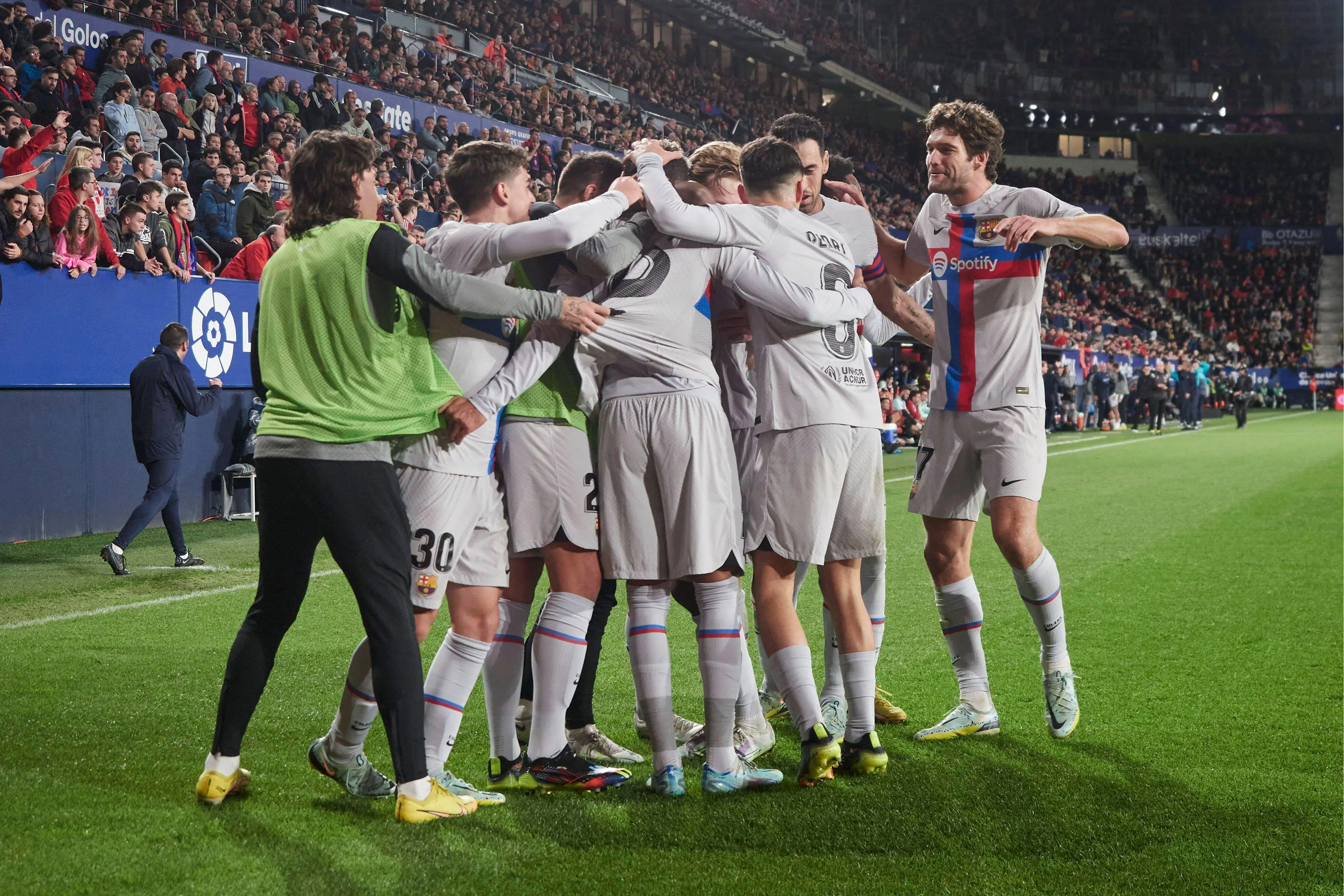 Barcelona players celebrate their winner. (Image