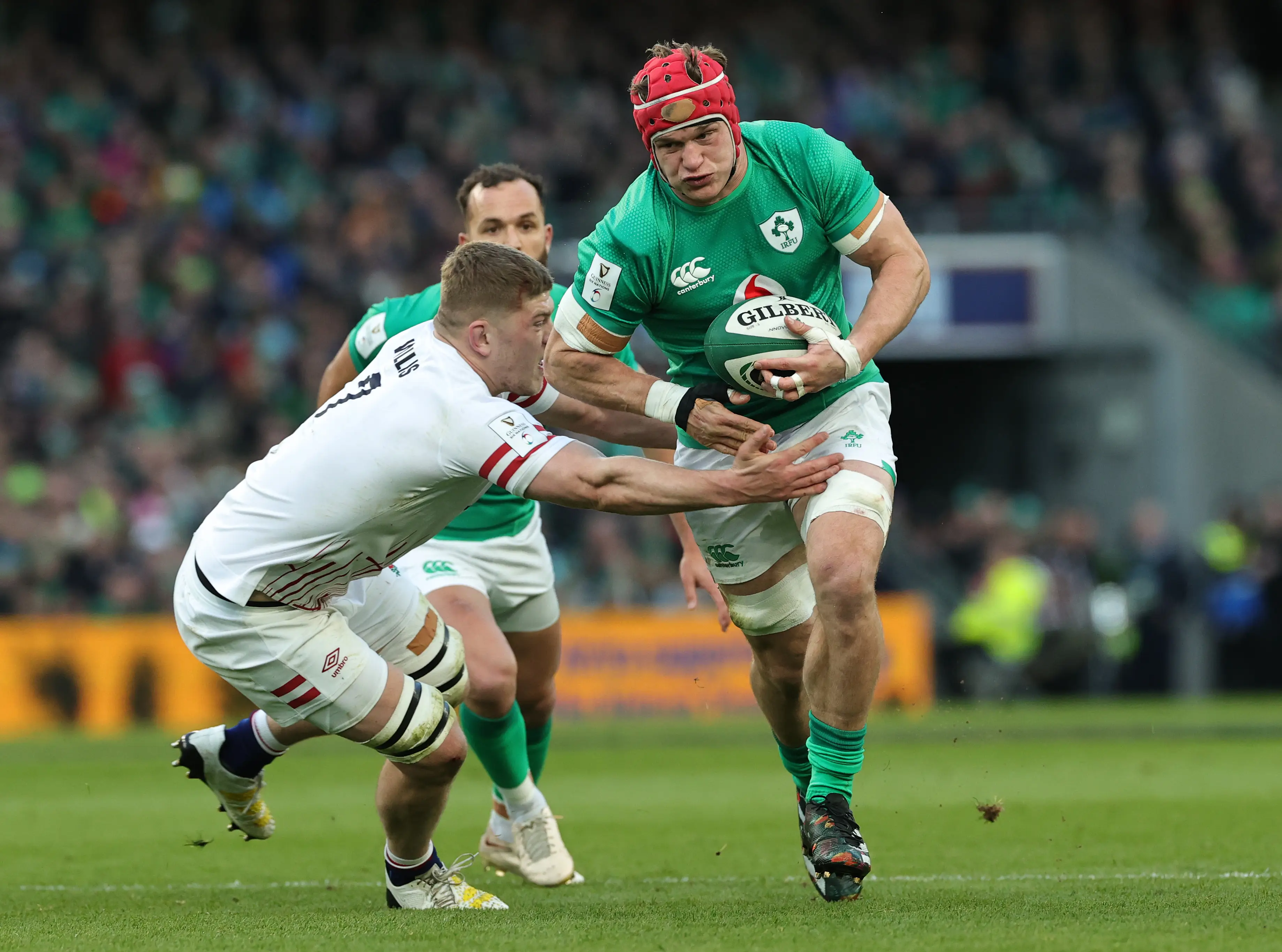 Josh van der Flier of Ireland is challenged by Jack Willis of England during the Six Nations Rugby match between Ireland and England 