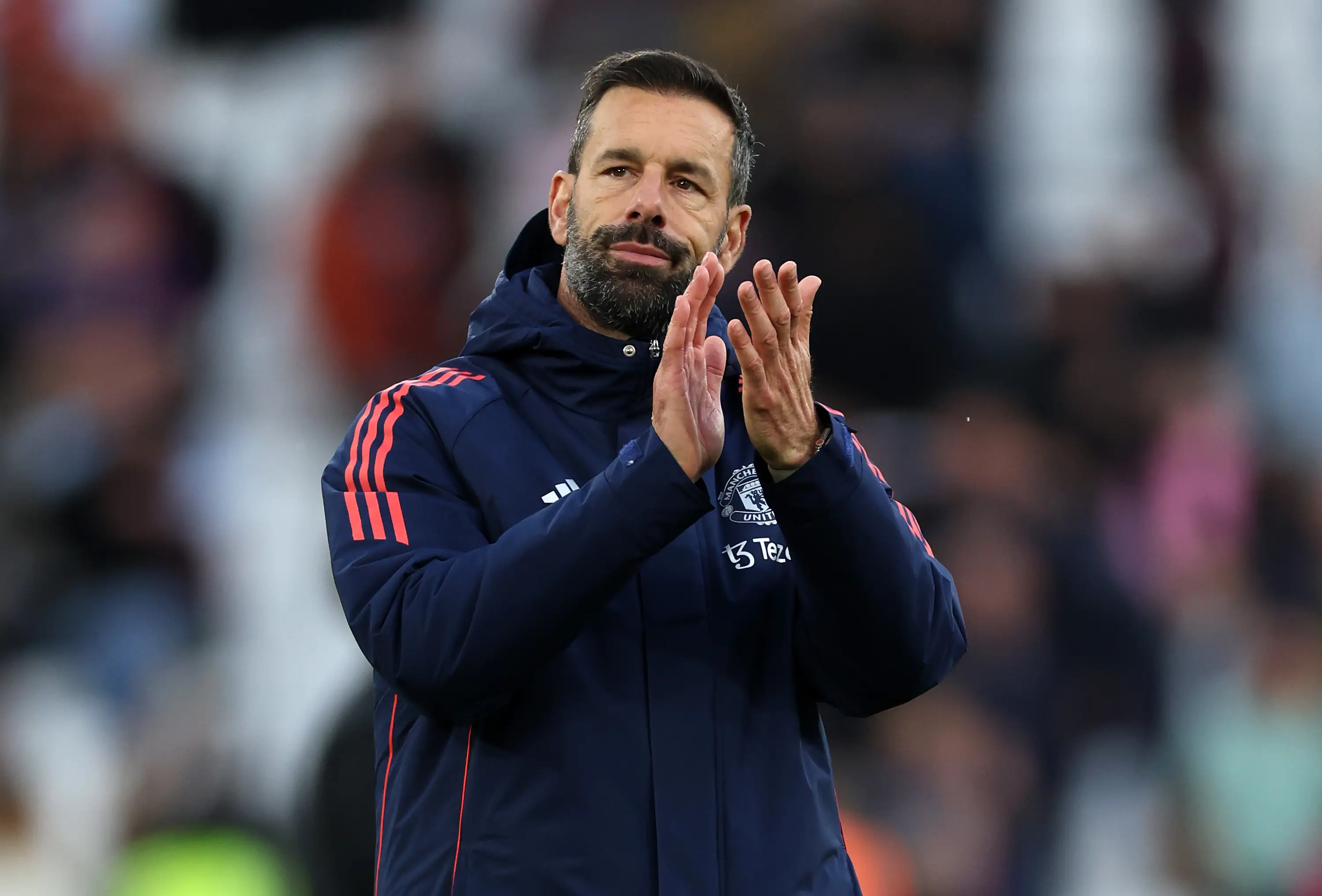Ruud van Nistelrooy applauds the travelling Manchester United support at West Ham United. Image: Getty 