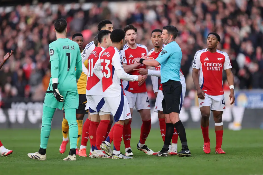 Myles Lewis-Skelly was sent off by referee Michael Oliver during Arsenal's 1-0 win over Wolves (Image: Getty)