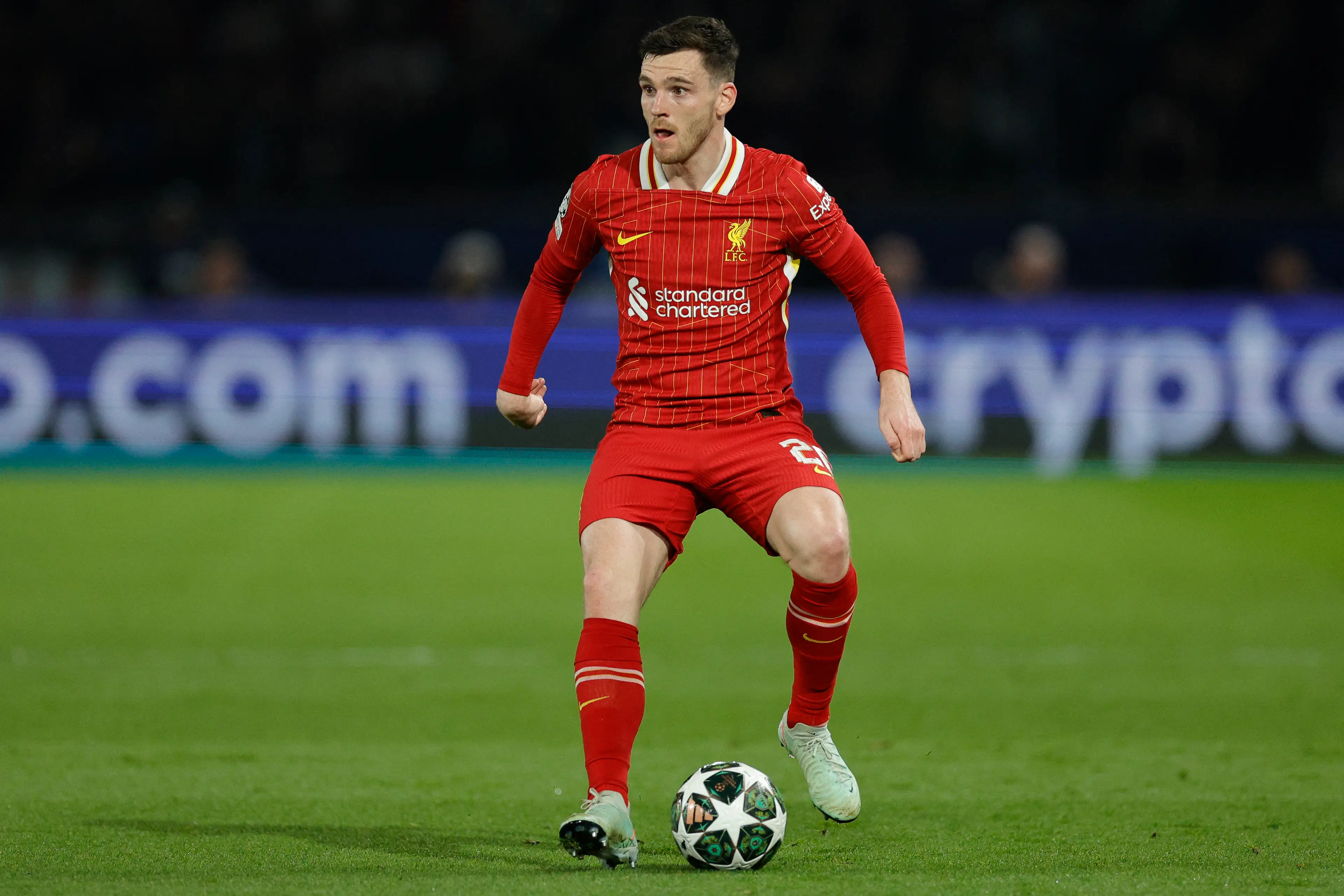 Andy Robertson endured a tough first half against PSG. Image: Getty