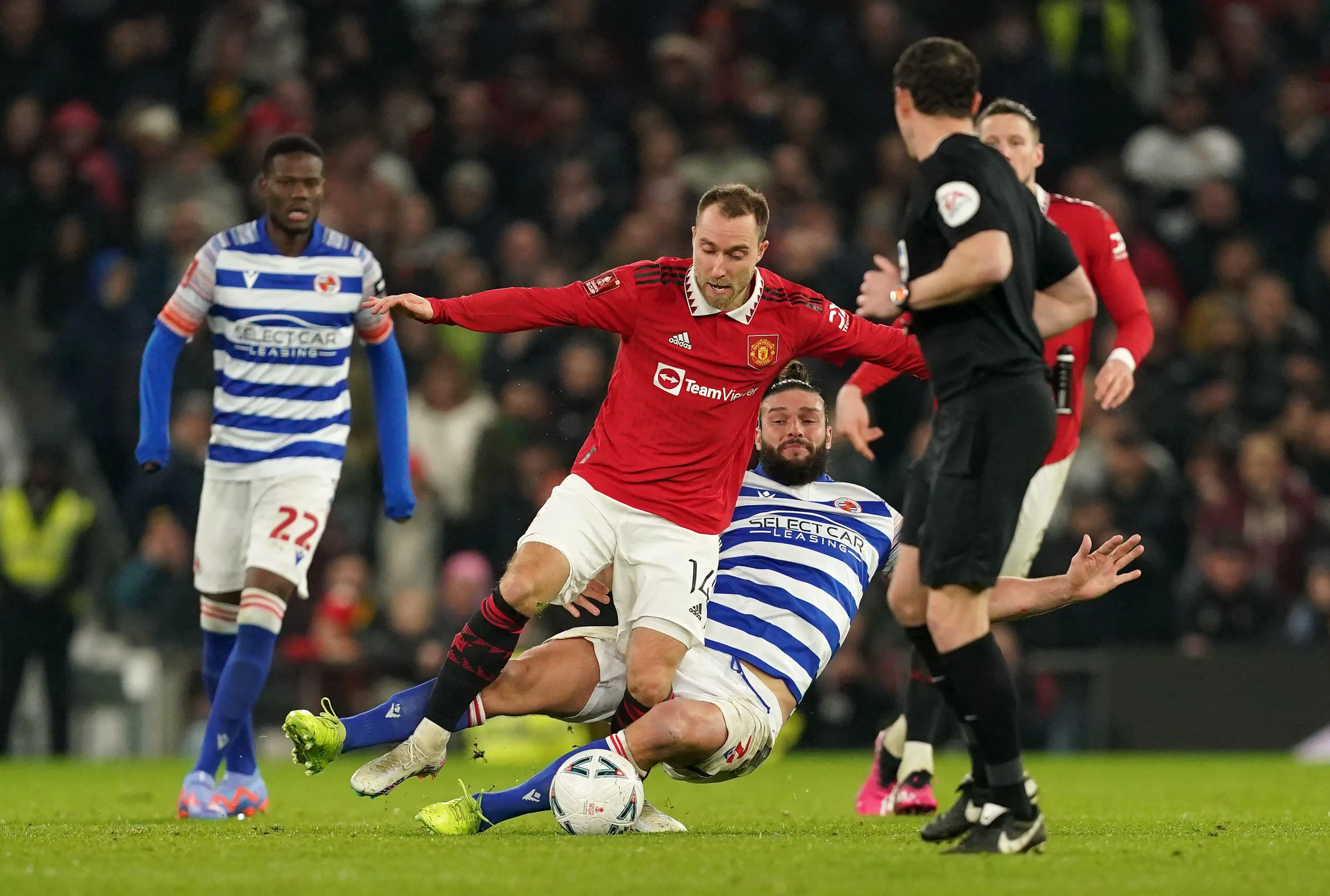 Andy Carroll tackles Christian Eriksen during Manchester United vs. Reading. Image: Alamy