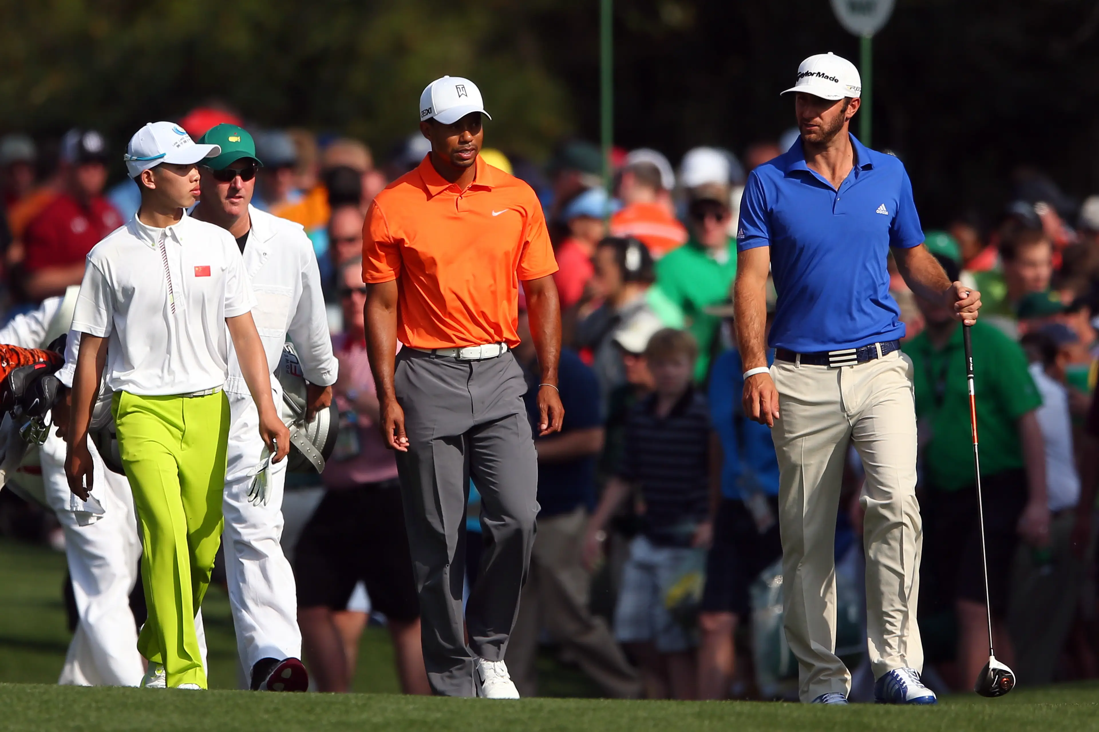 Guan played with Tiger Woods in practice. Image: Getty