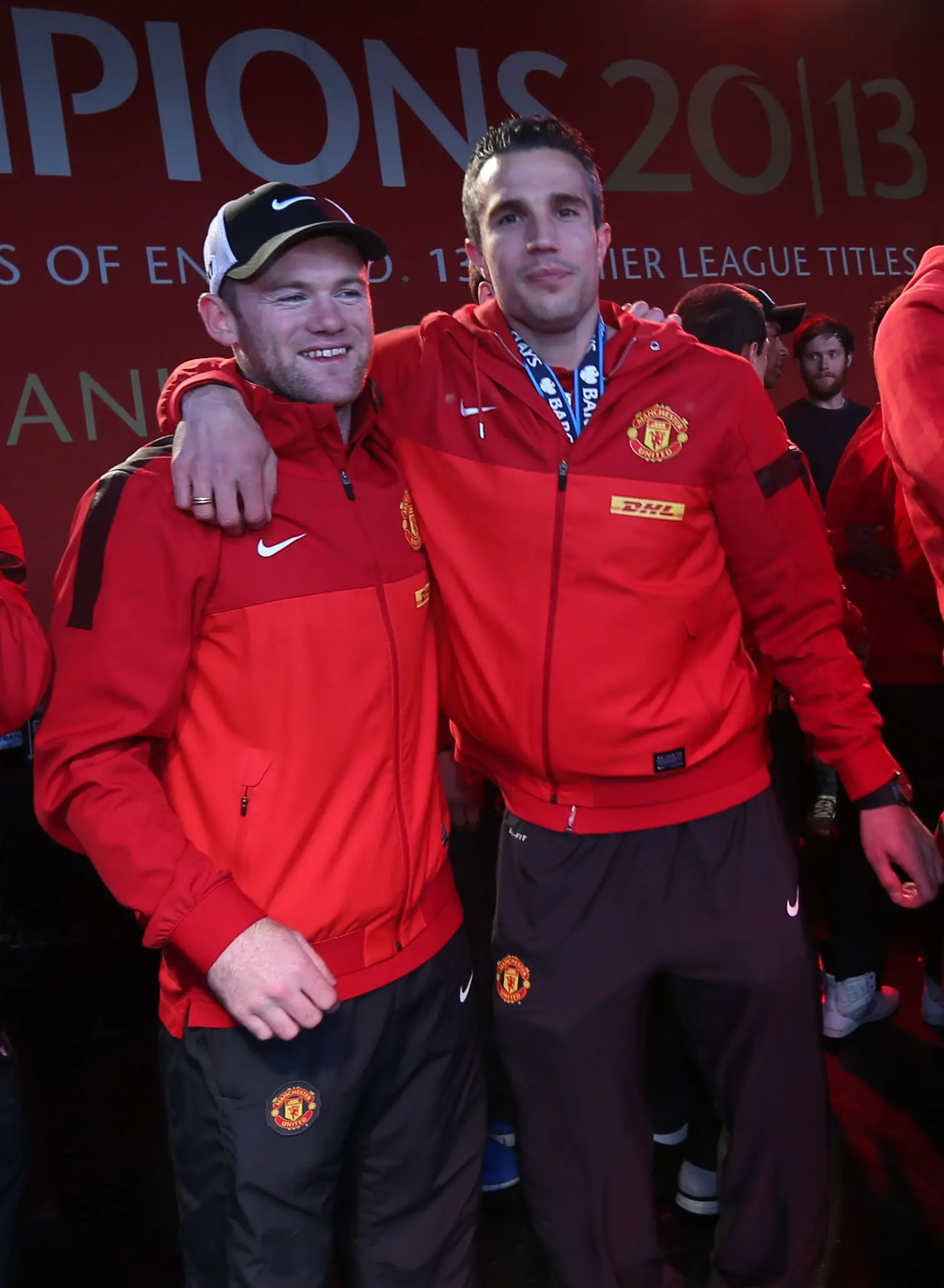 Rooney and Van Persie celebrate United's 2013 title / Photo by John Peters/Manchester United via Getty Images