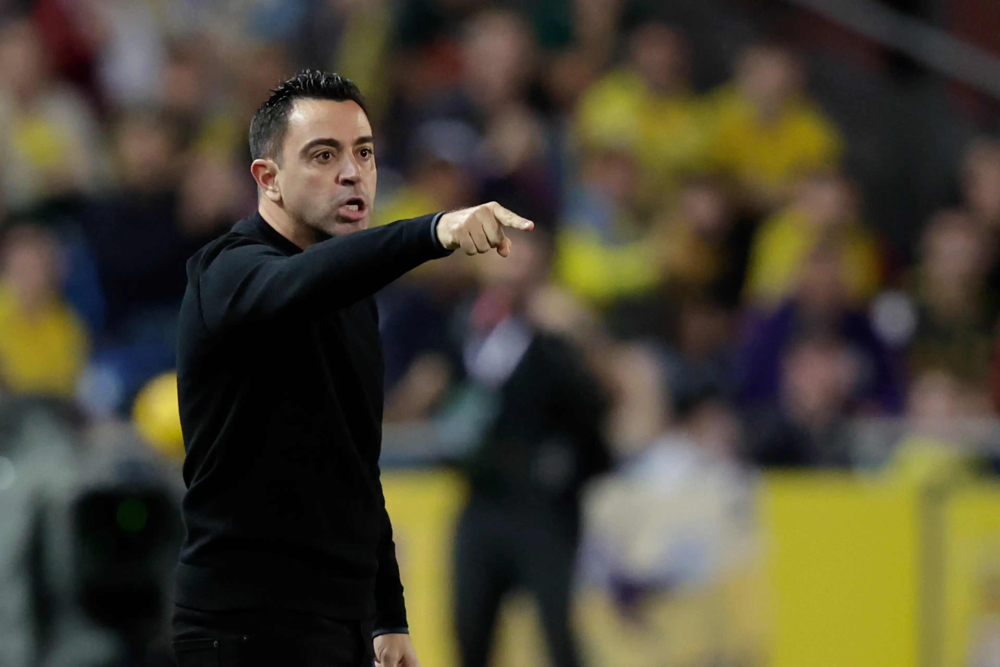 Xavi fumes on the touchline. Image: Getty