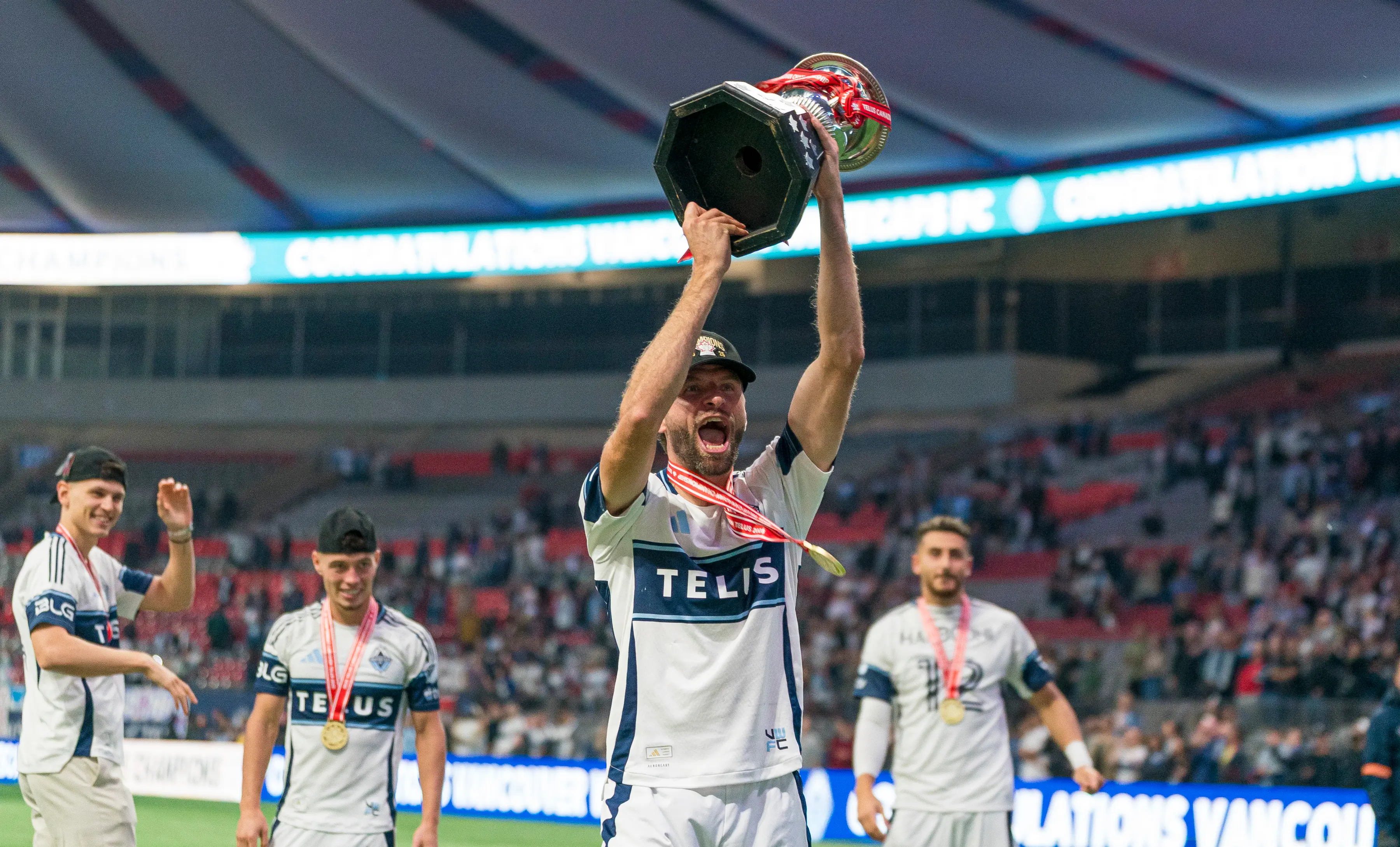 Thomas Muller lifting the trophy. Image: Rich Lam / Stringer via Getty