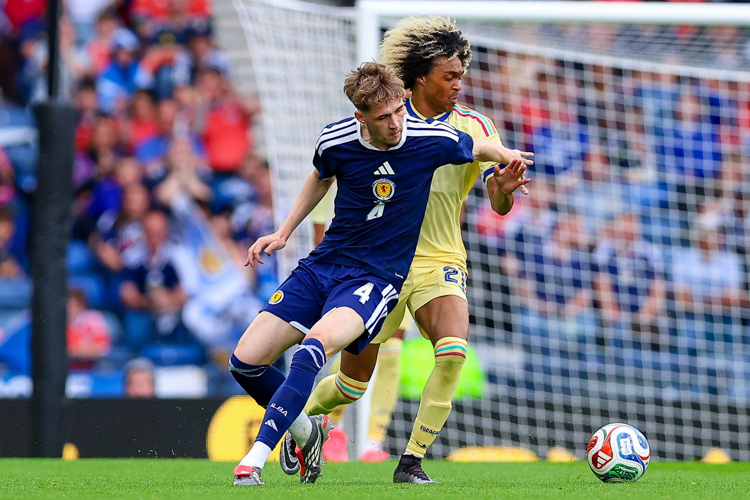 Fletcher battles with former Manchester United winger Tahith Chong. Image credit: Getty