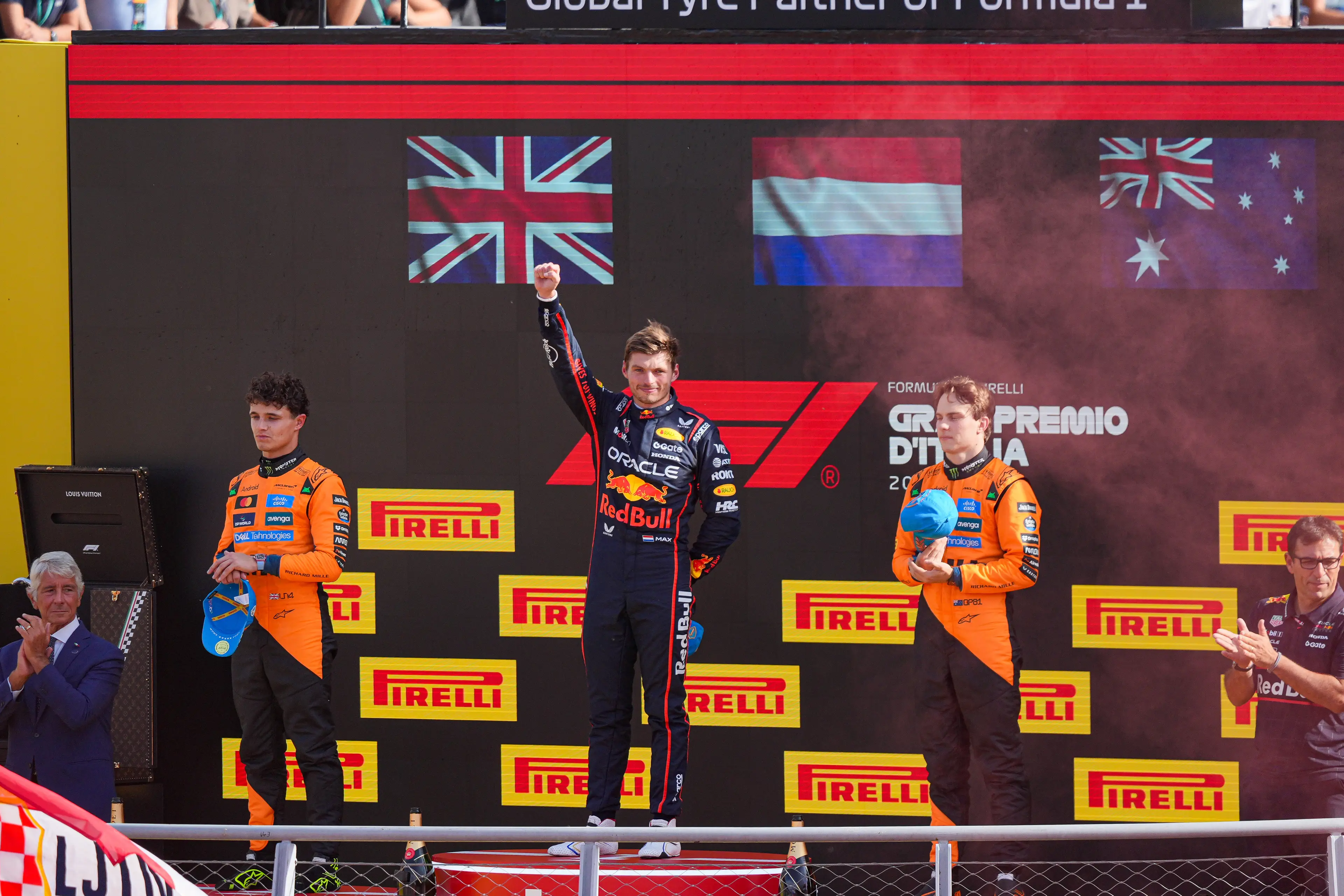 Max Verstappen, Lando Norris and Oscar Piastri on the podium. (Image: NurPhoto / Contributor via Getty)