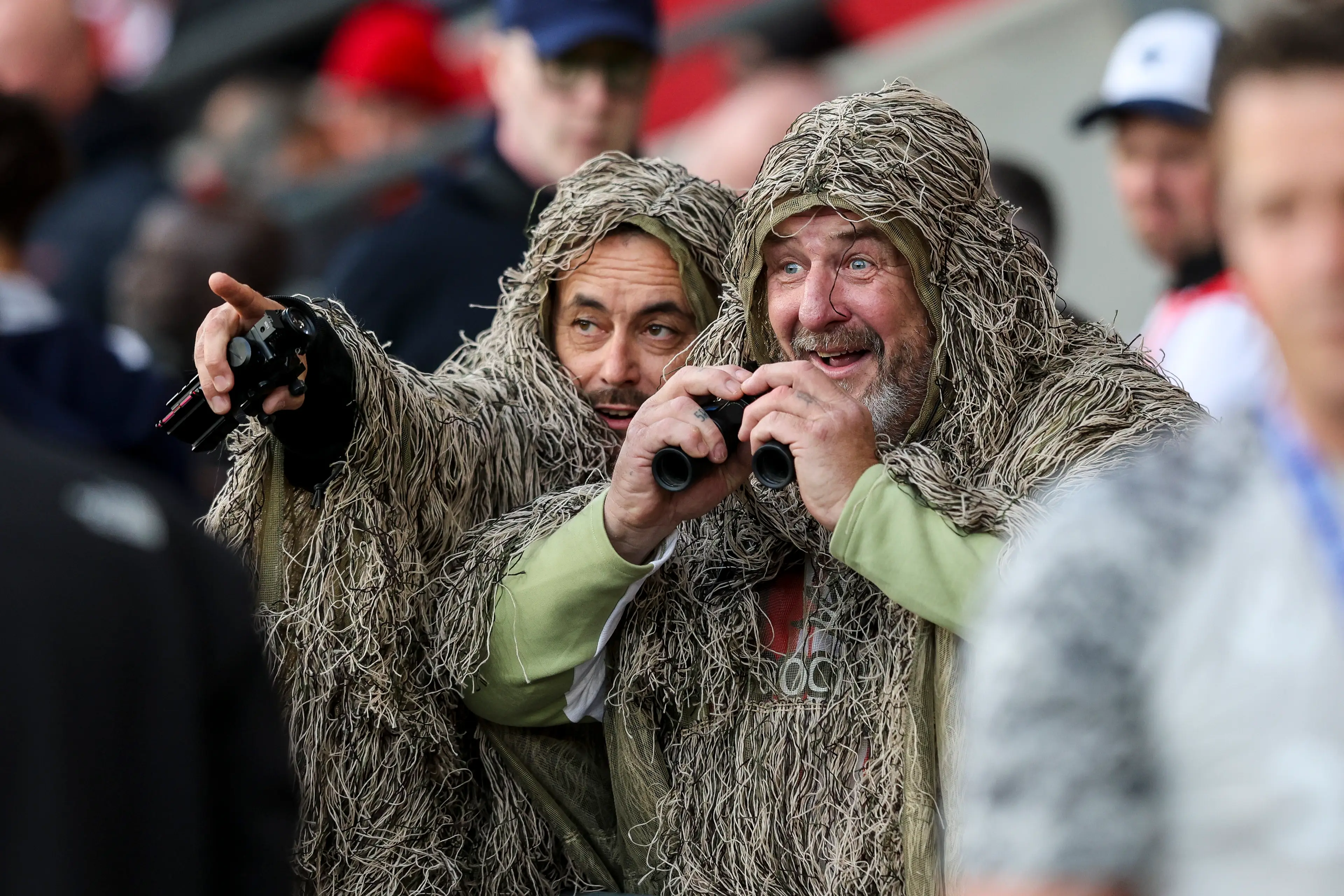 Southampton fans in camouflage ghillie suits after their side was accused of spying on a Middlesbrough training session. Image credit: Getty