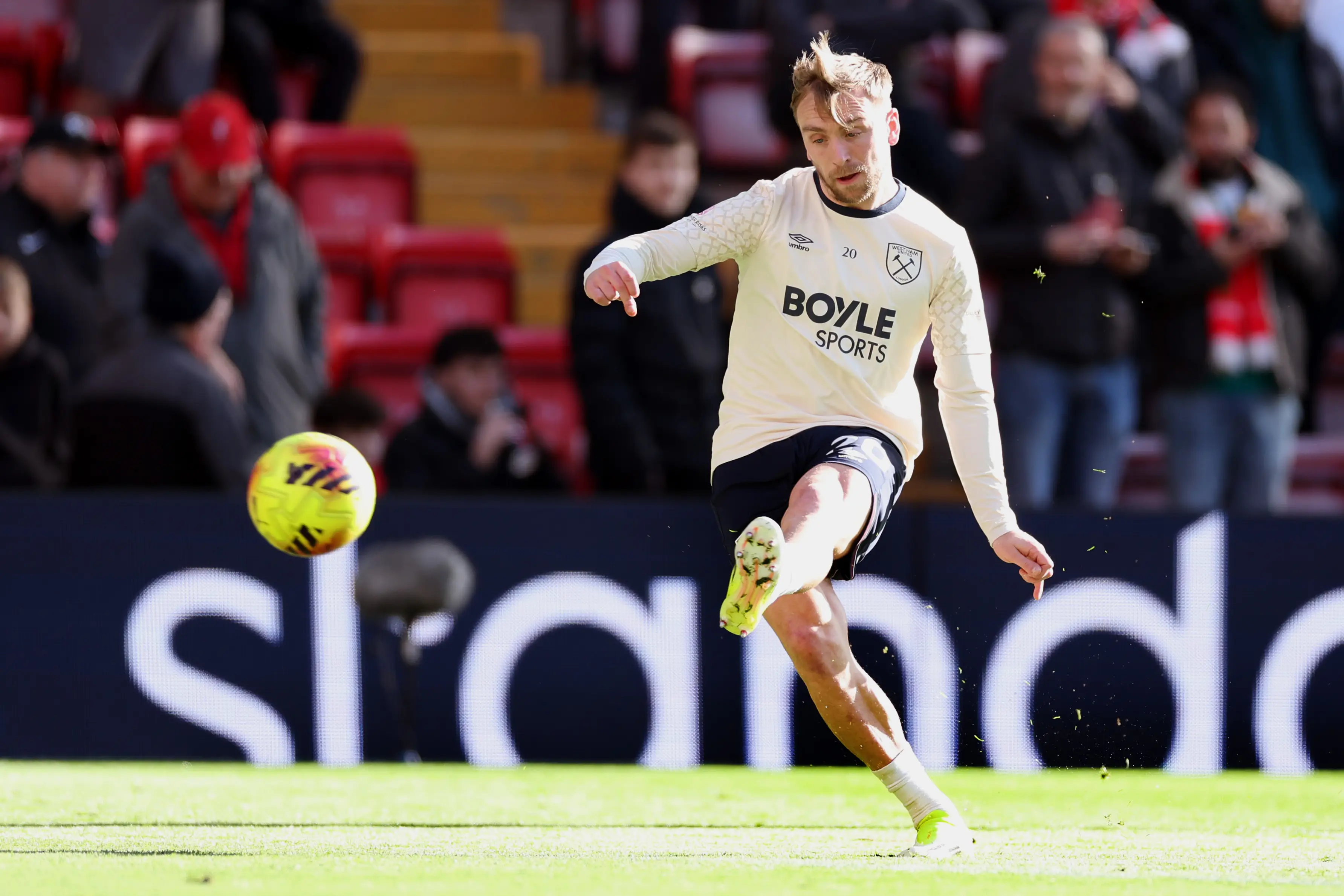 Jarrod Bowen warming up vs Liverpool (credit: getty)