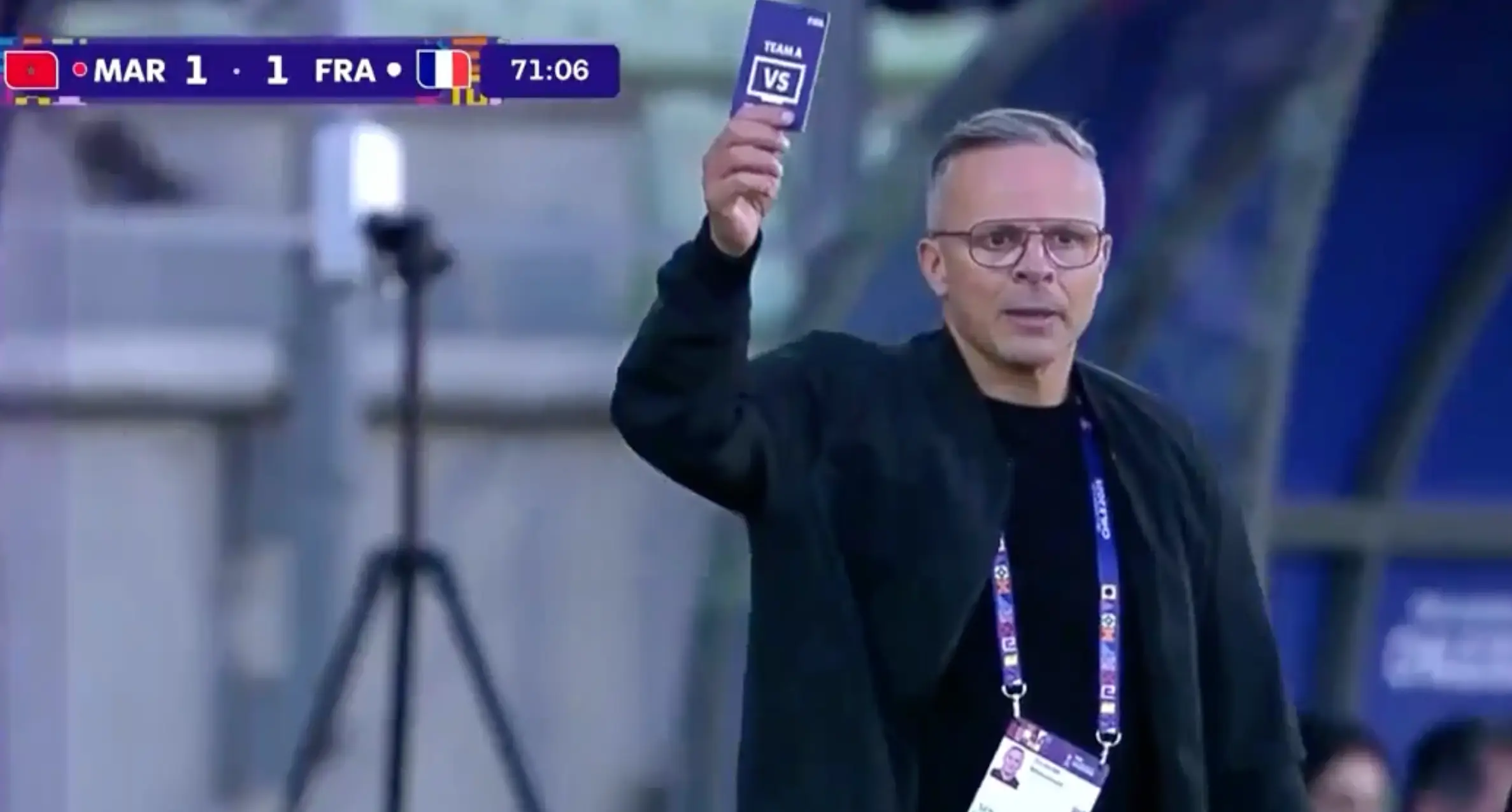 Morocco manager Chamed Ouahbi waves the review card. Image credit: beIN Sports.