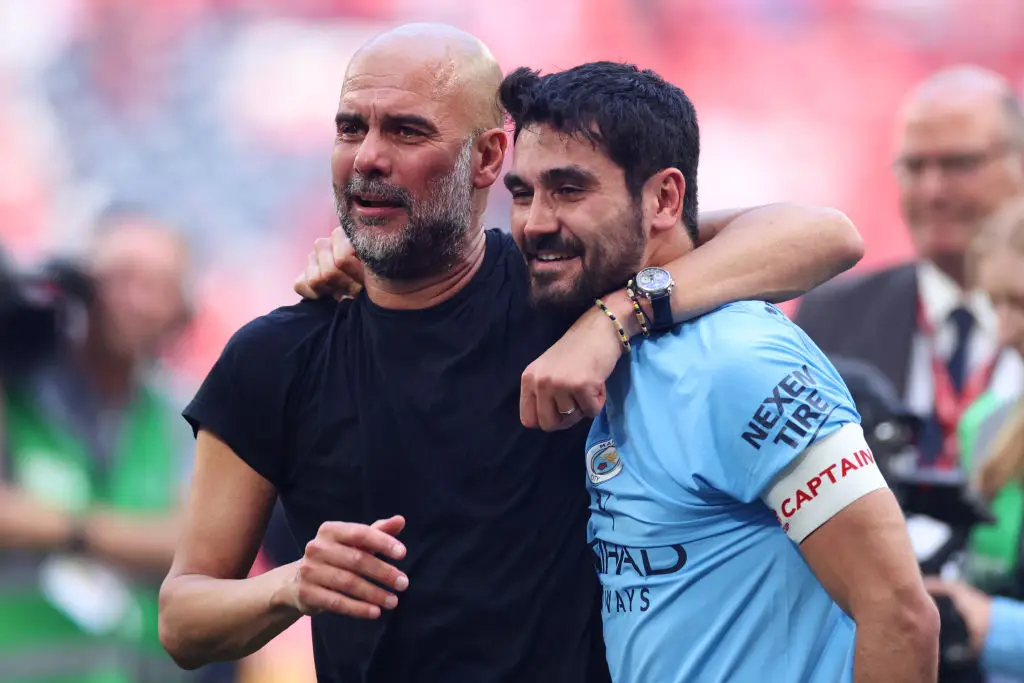 Pep Guardiola and Ilkay Gundogan celebrate after Man City win the 2023 FA Cup -