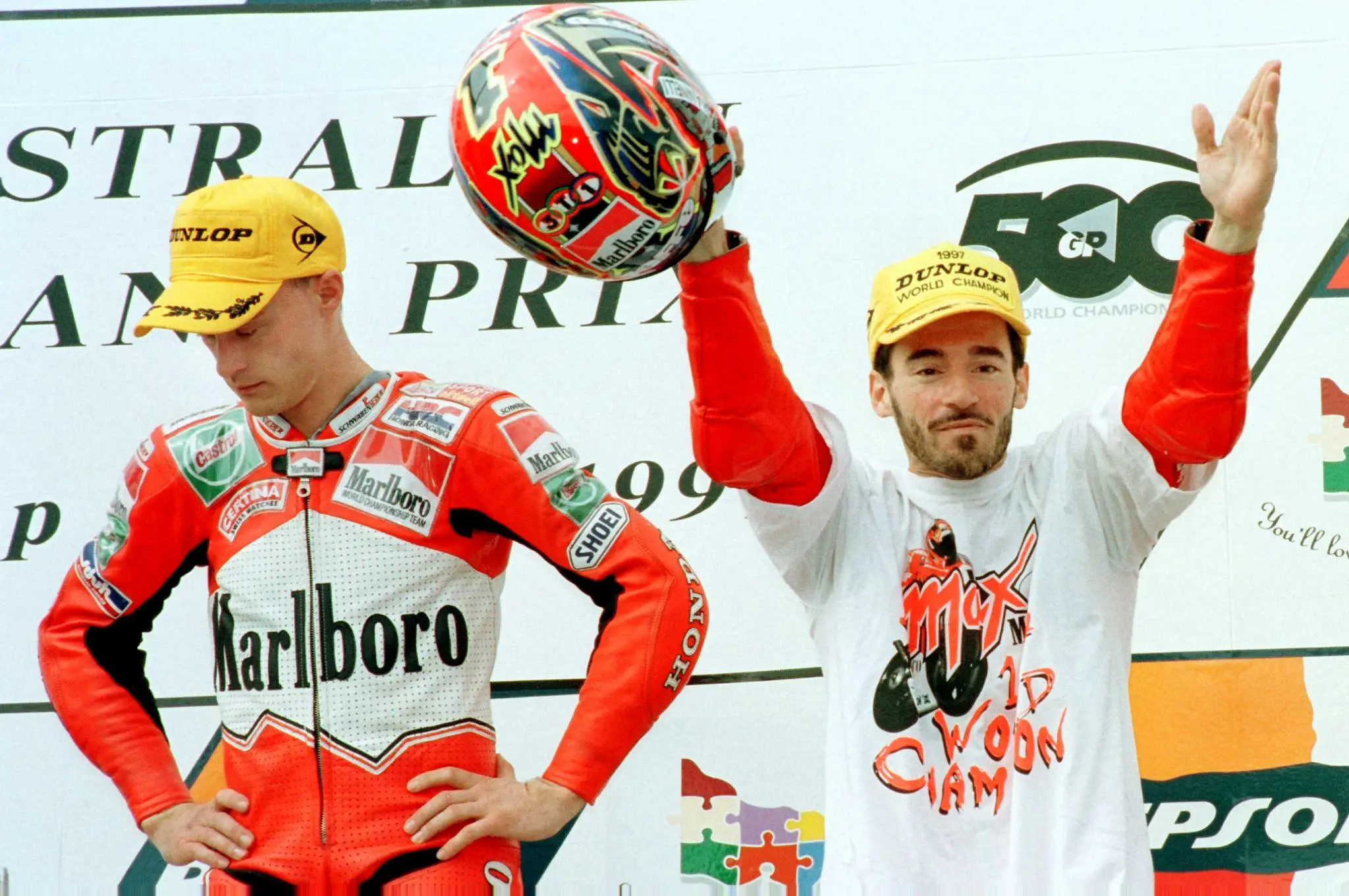Max Biaggi (right) celebrates after winning the 1997 250cc world championship (Image: Getty)