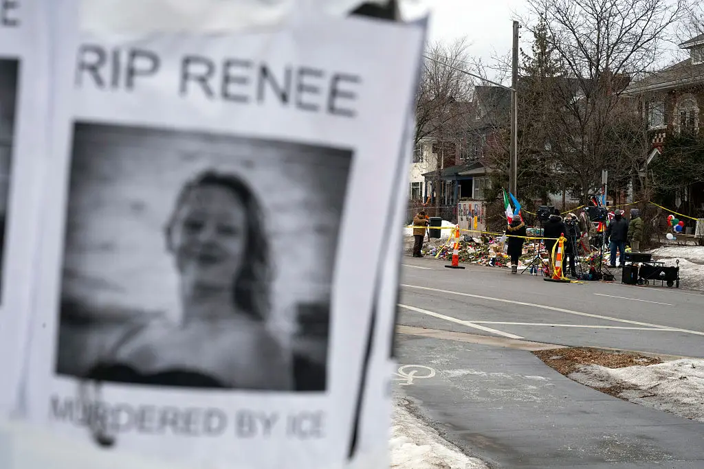 People gather at the memorial for Renee Good, the 37-year-old woman fatally shot by an ICE agent. Image credit: Getty