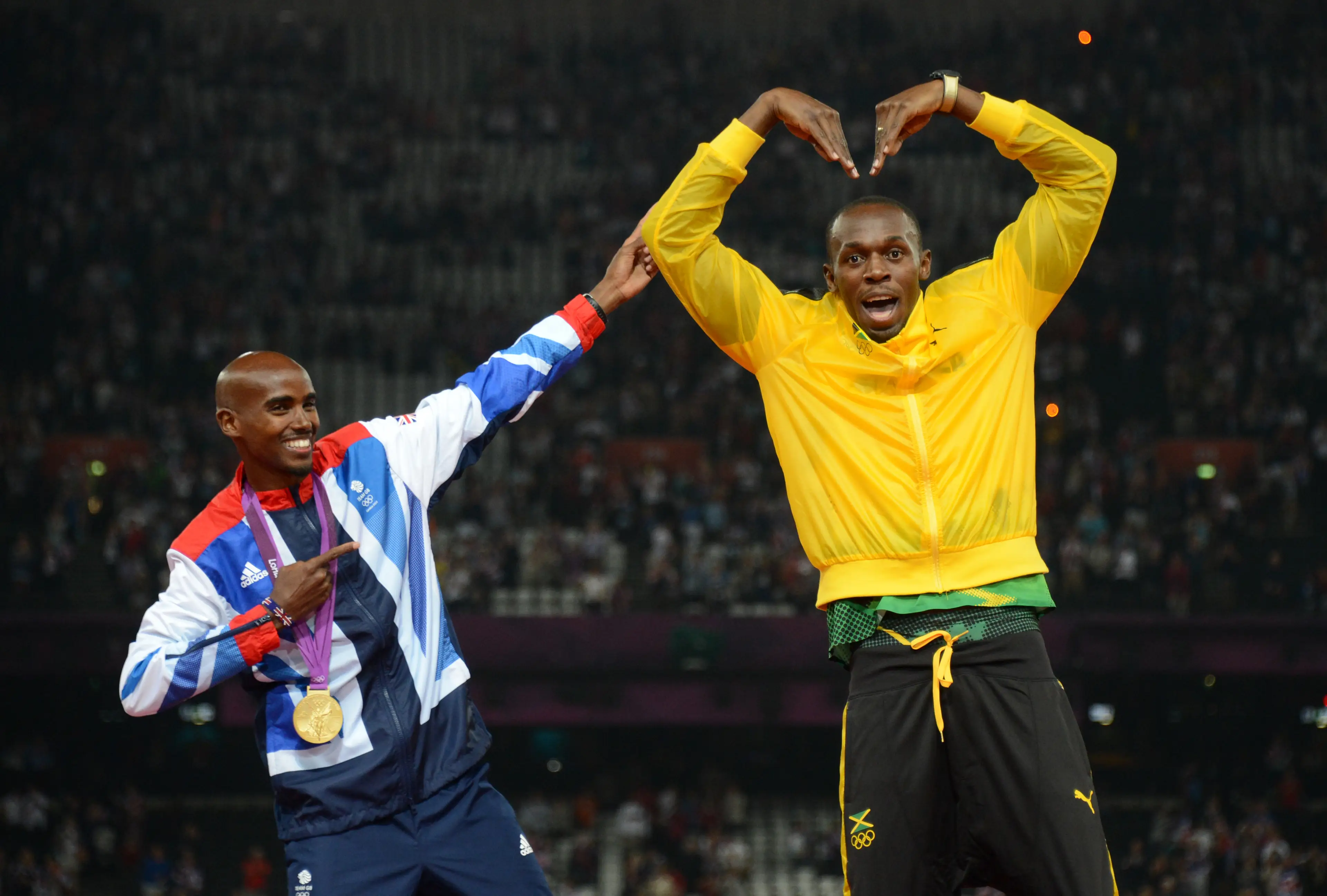 Mo Farah and Usain Bolt at the 2012 Olympic Games in London. Image: Getty