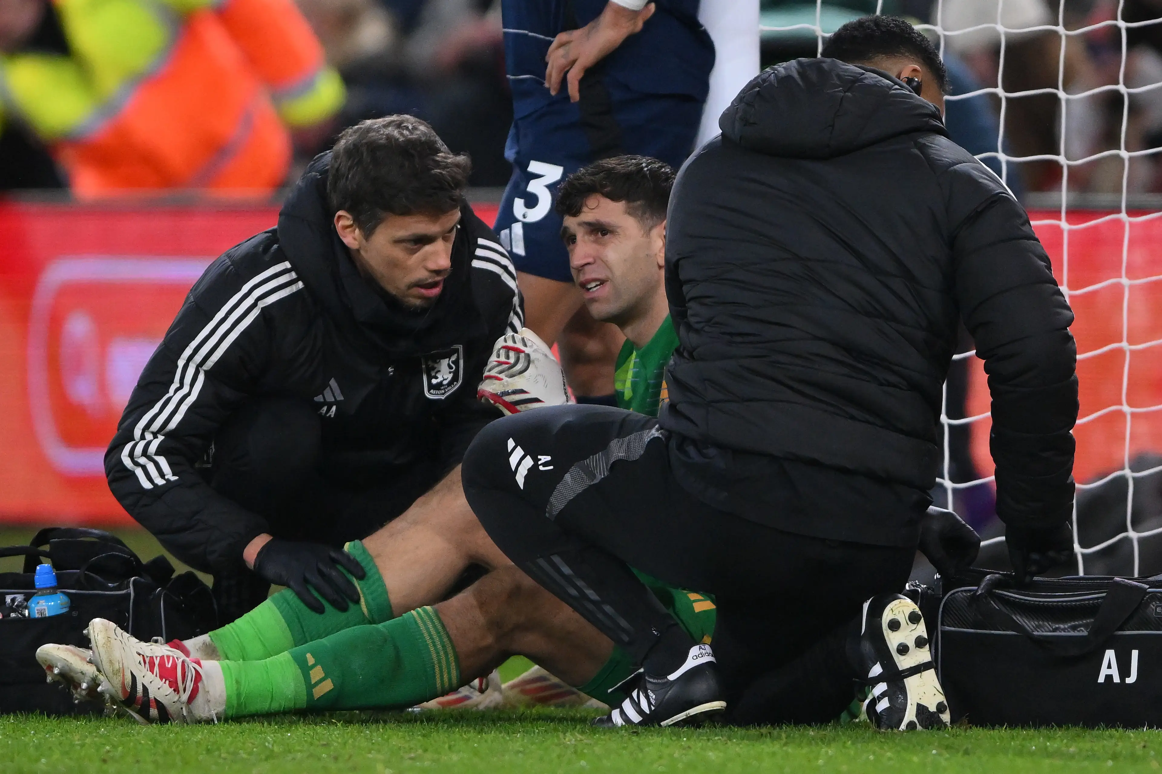 Emiliano Martinez receives medical attention during the Premier League clash between Aston Villa and Nottingham Forest. Image credit: Getty